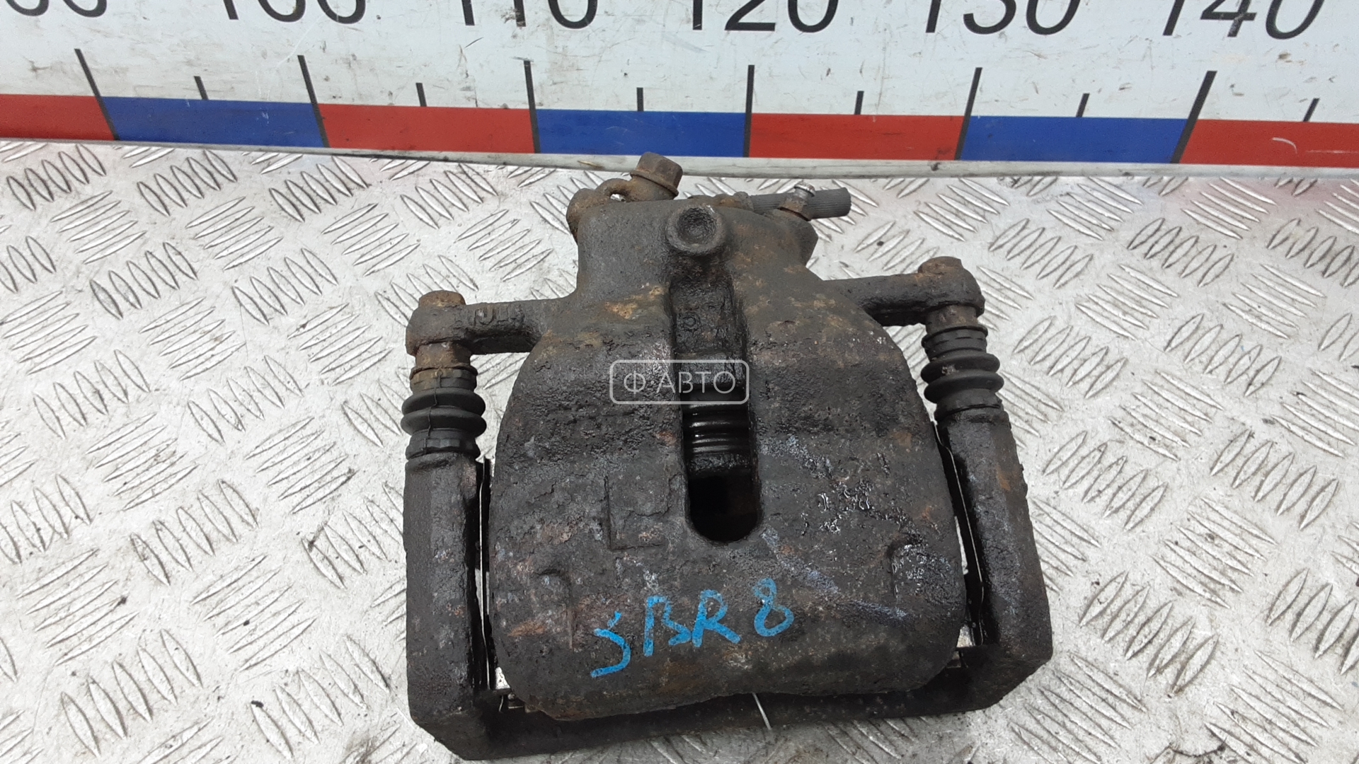 Суппорт тормозной передний левый