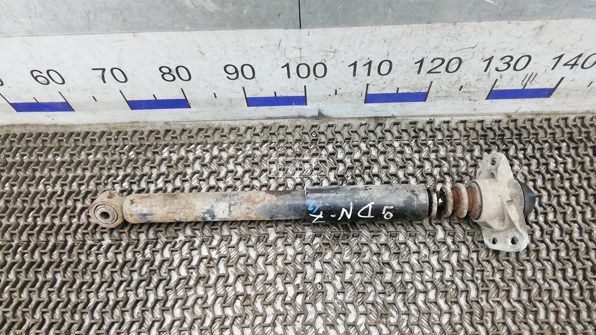 Амортизатор задней балки