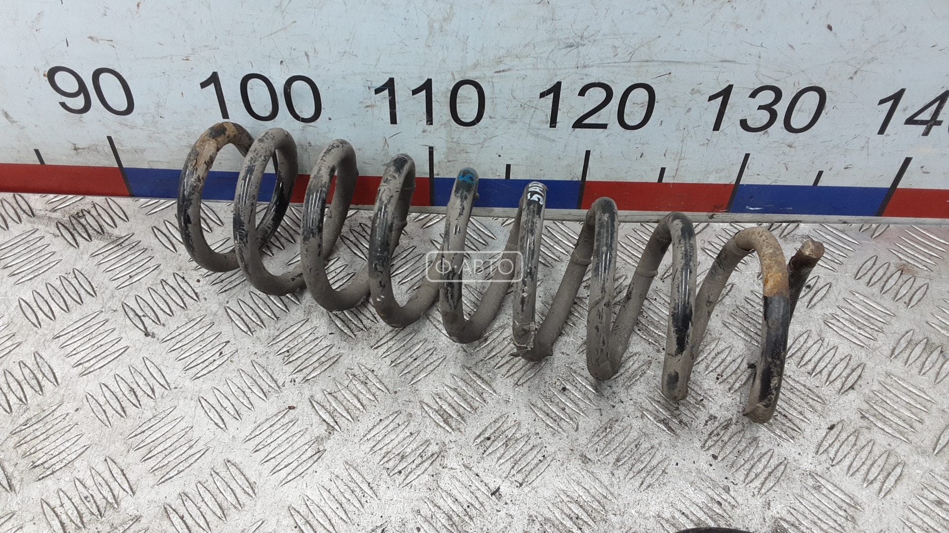 Пружина задняя