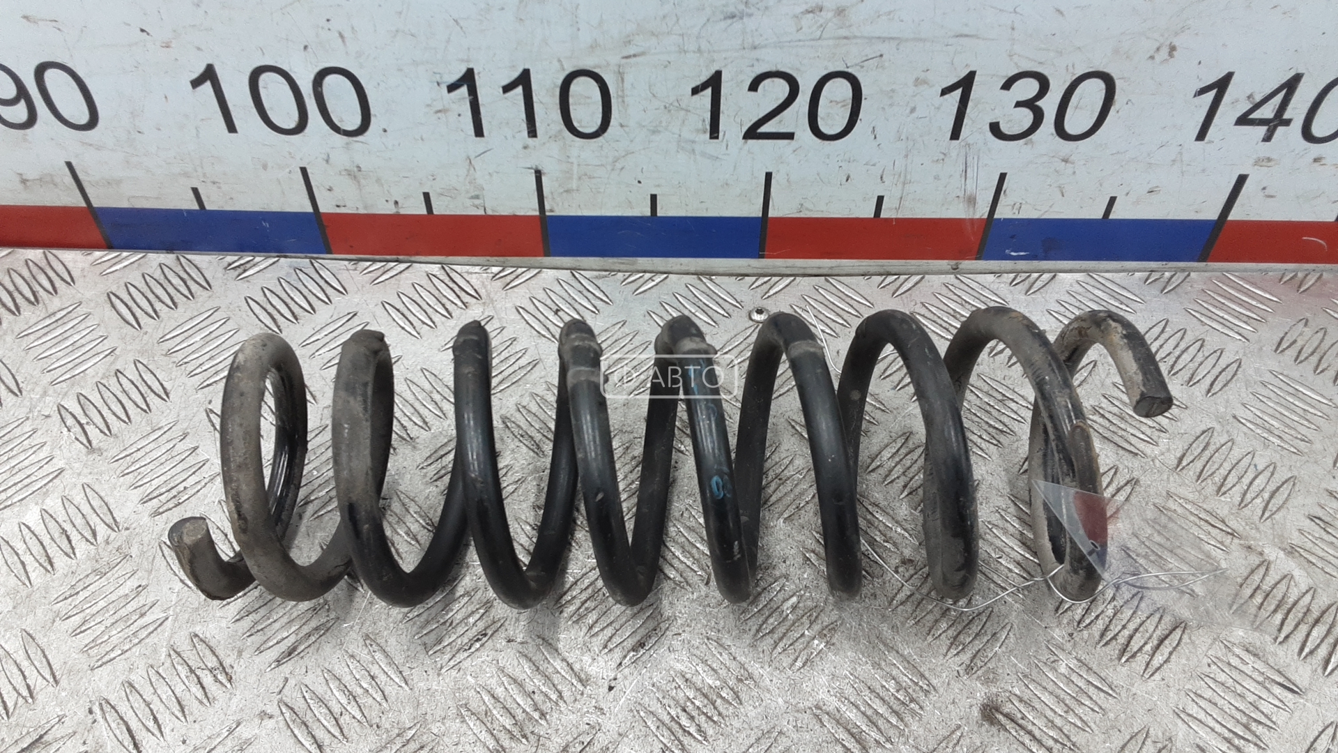 Пружина задняя