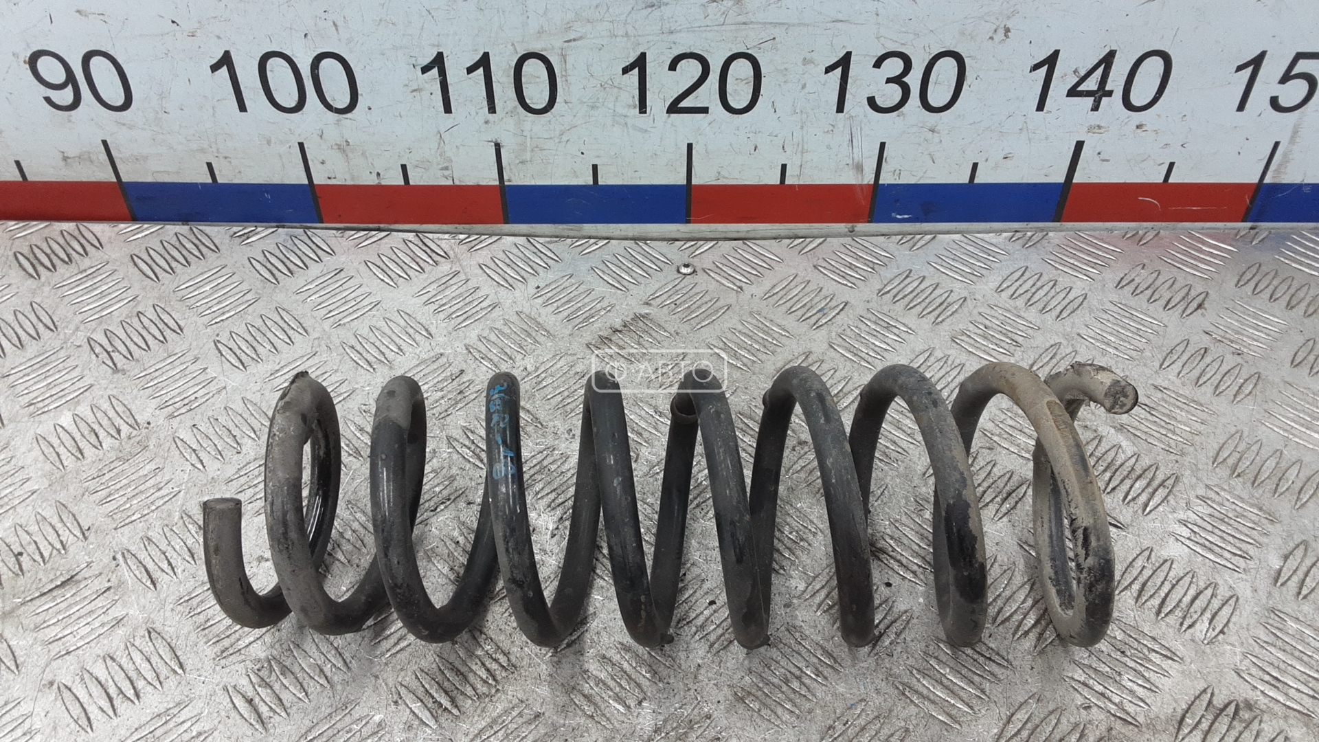 Пружина задняя