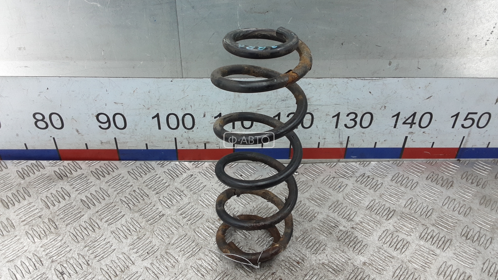 Пружина задняя