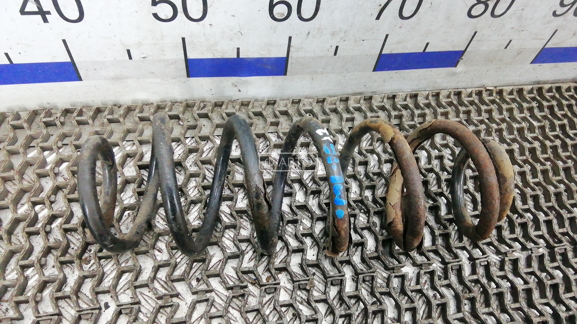 Пружина задняя