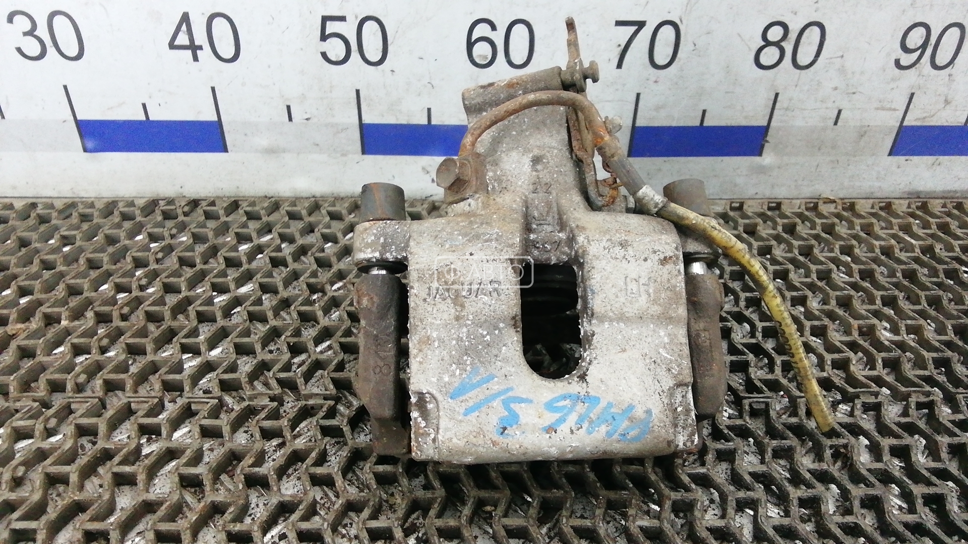 Суппорт тормозной задний левый