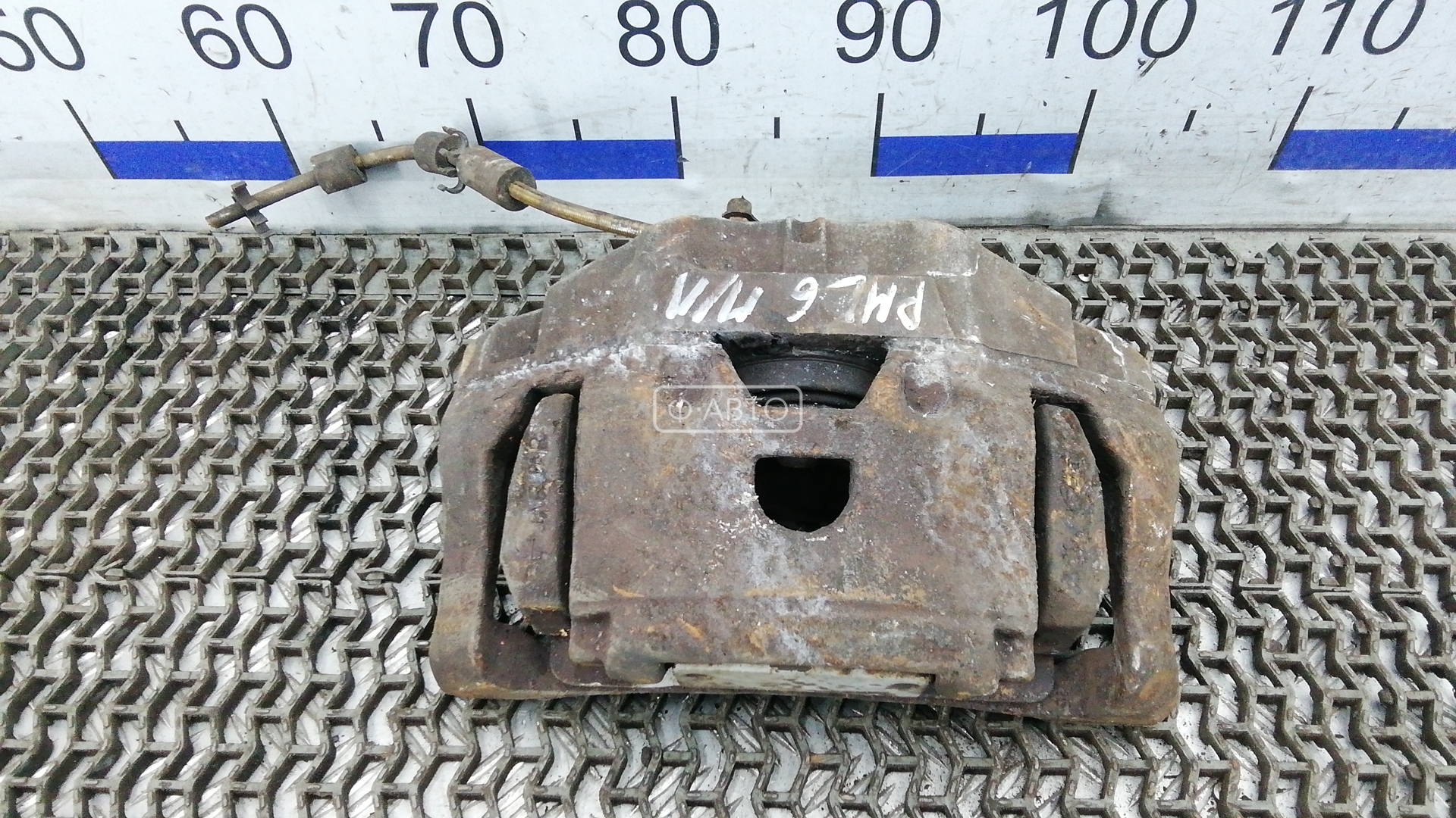 Суппорт тормозной передний левый