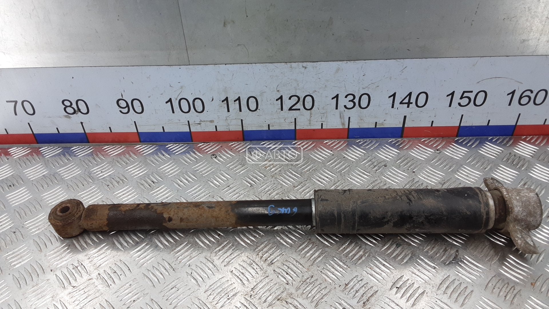 Амортизатор задней балки