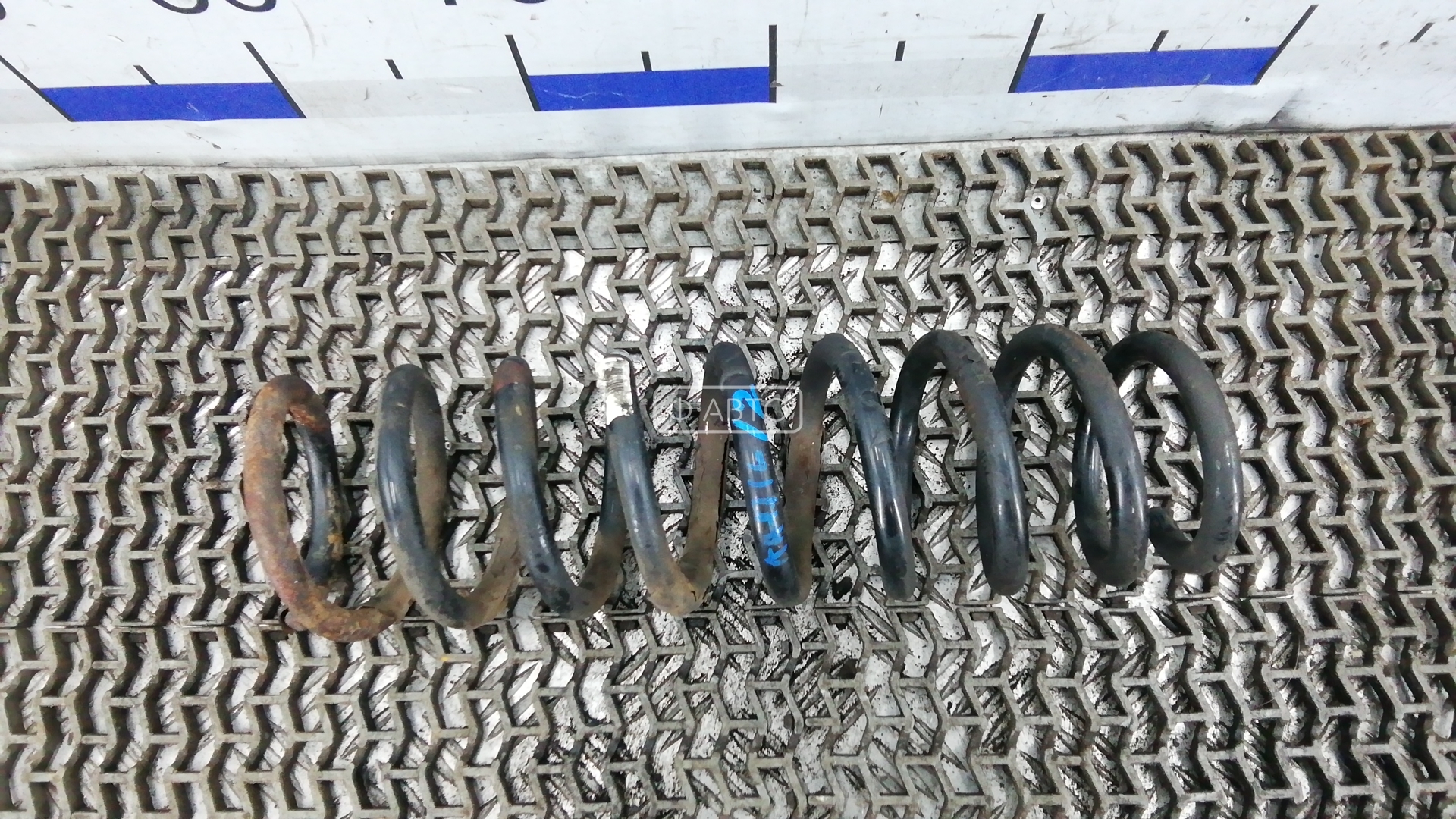 Пружина задняя