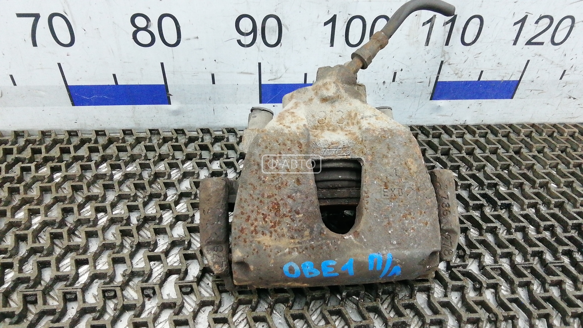 Суппорт тормозной передний левый