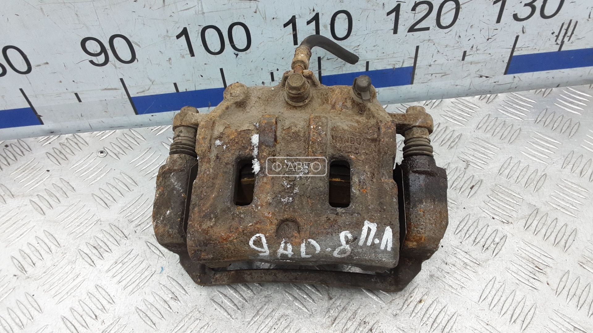 Суппорт тормозной передний левый