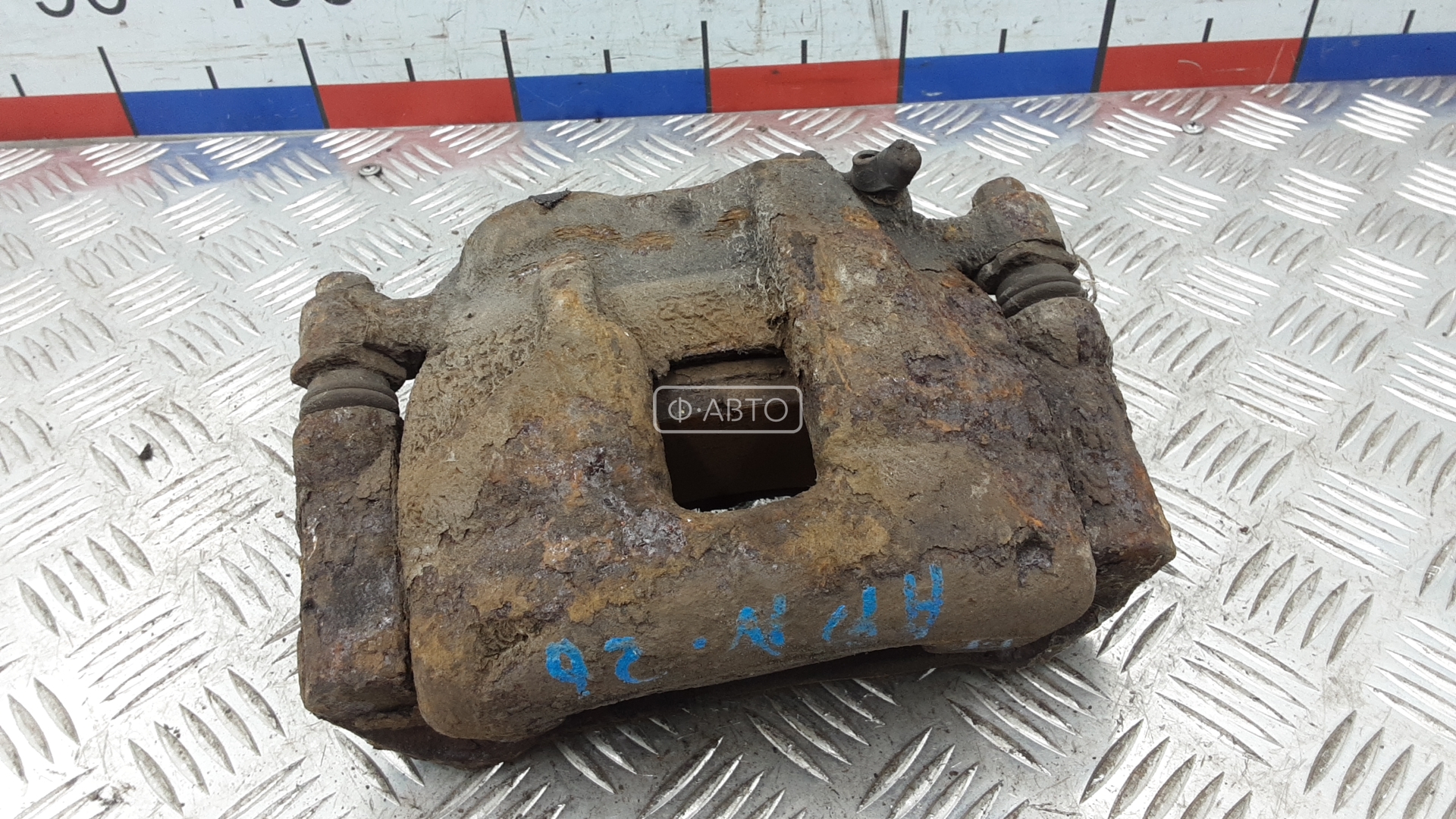 Суппорт тормозной передний левый