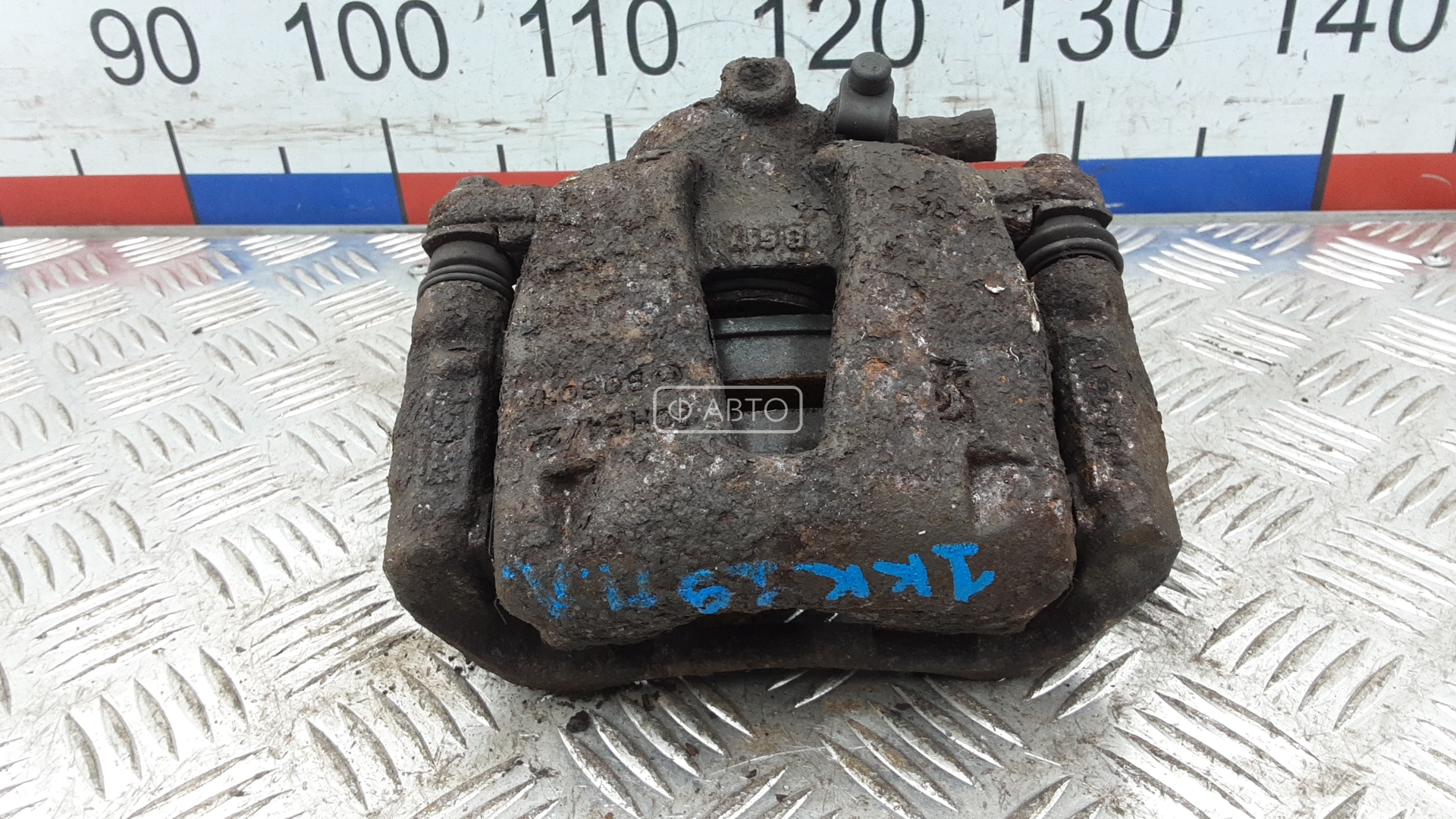 Суппорт тормозной передний левый