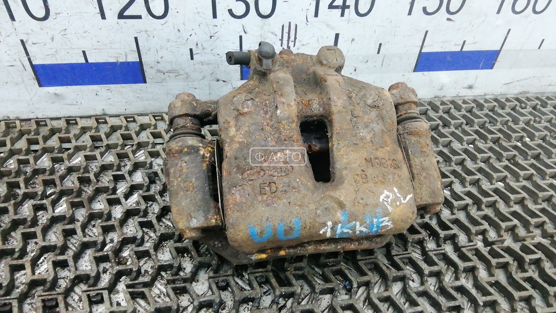 Суппорт тормозной передний левый