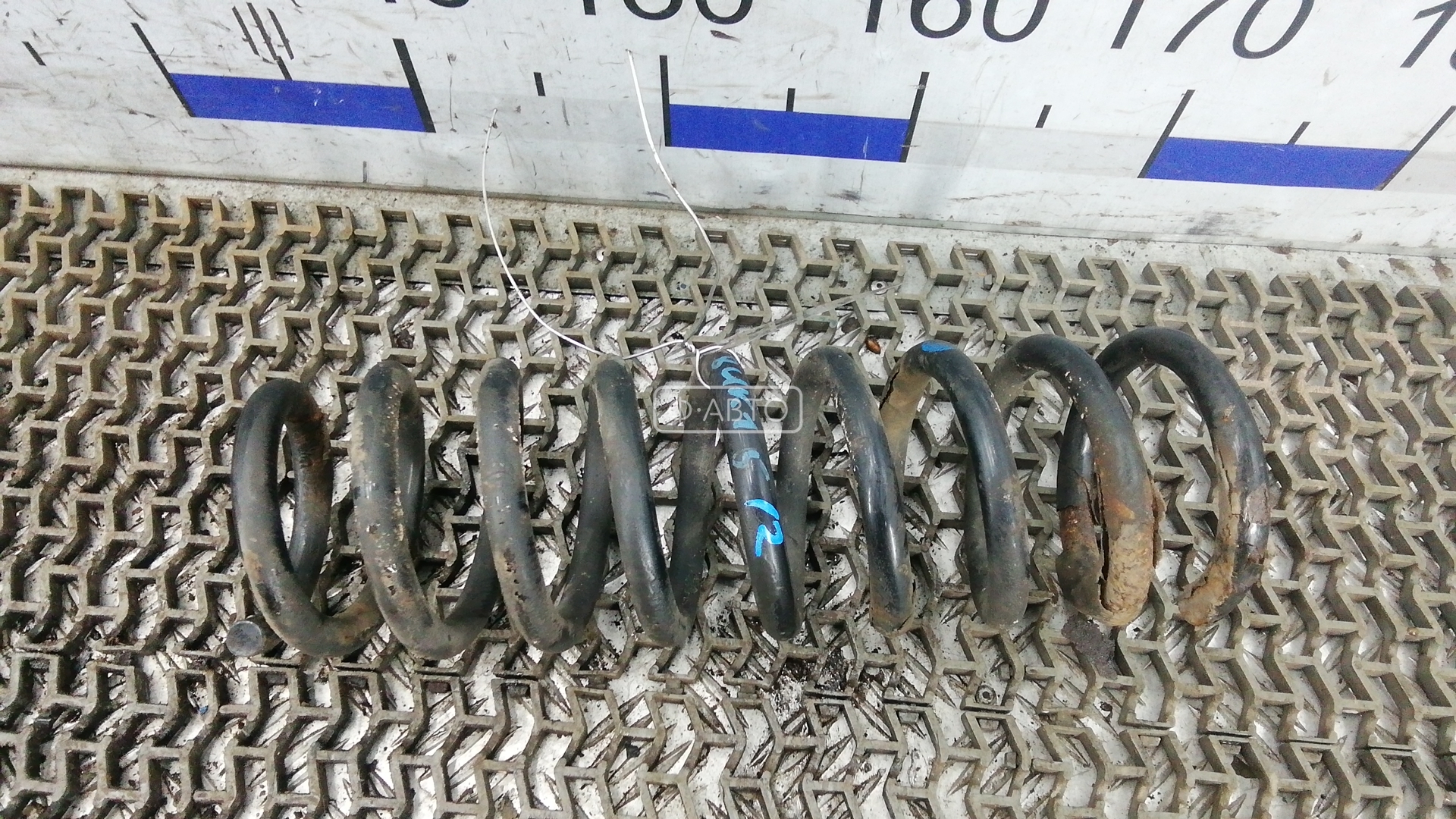 Пружина задняя