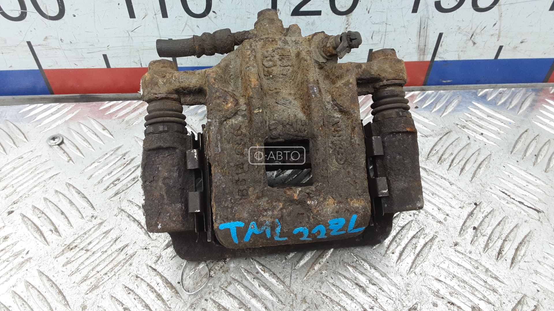 Суппорт тормозной задний левый