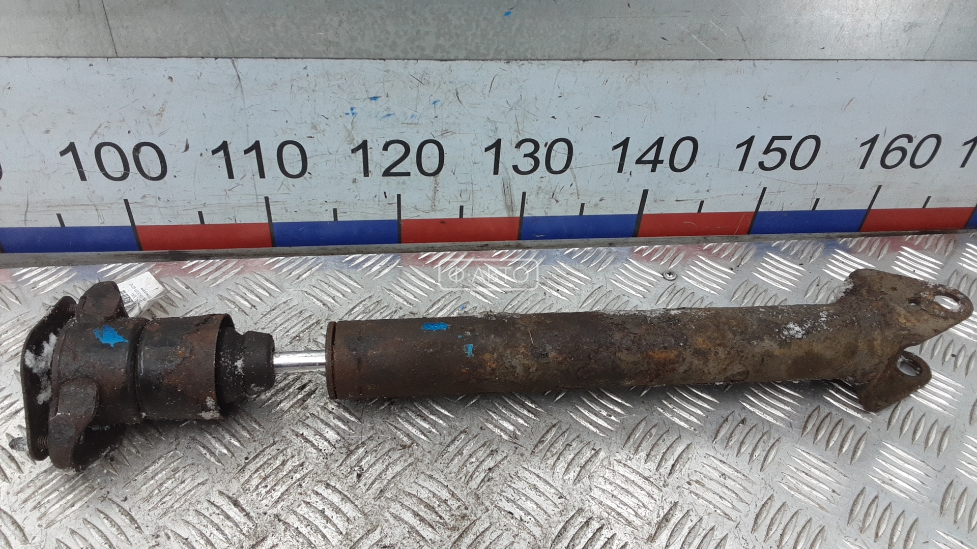 Амортизатор задней балки