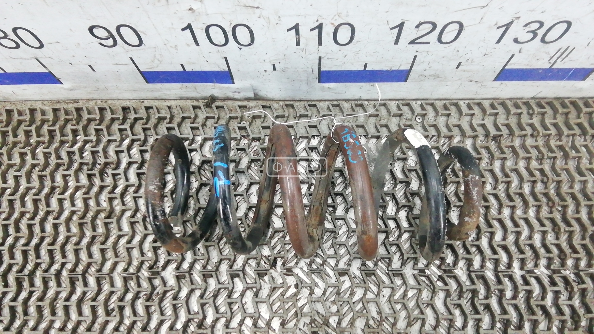 Пружина задняя