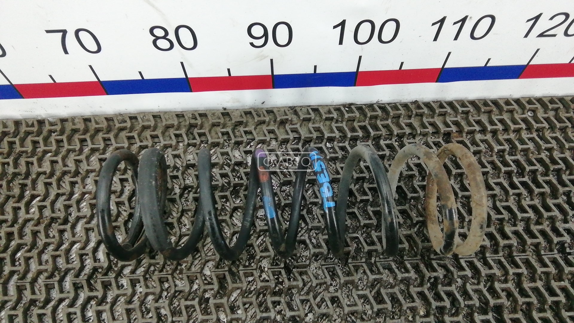 Пружина задняя