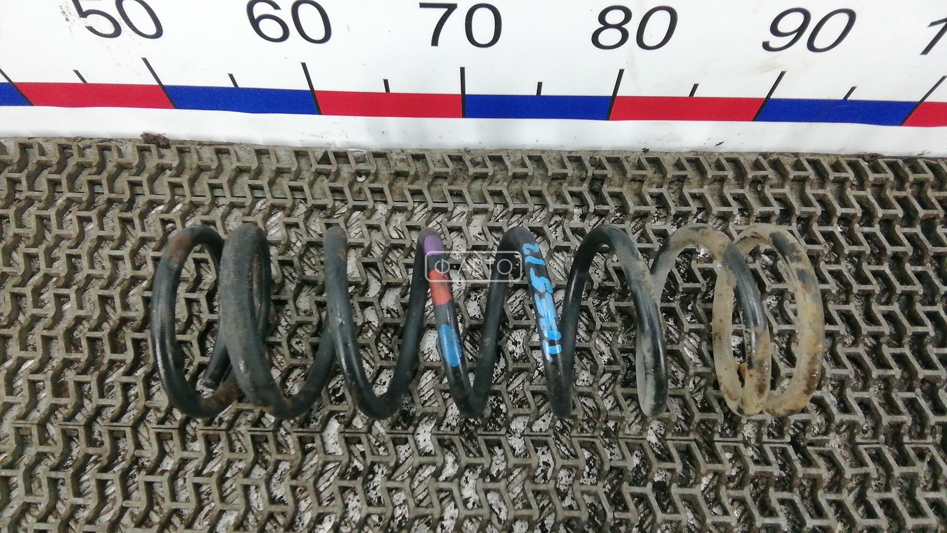 Пружина задняя