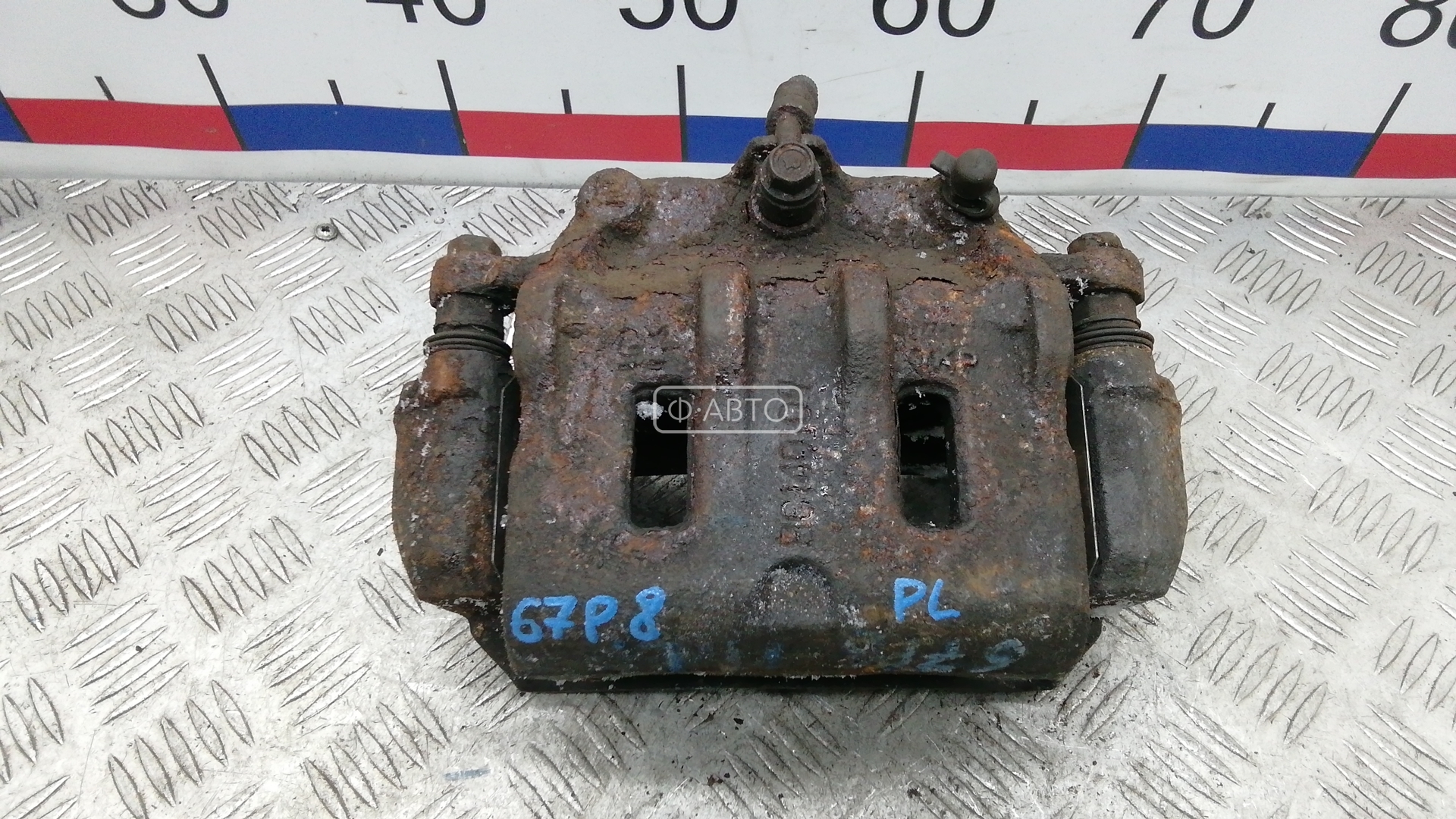 Суппорт тормозной передний левый