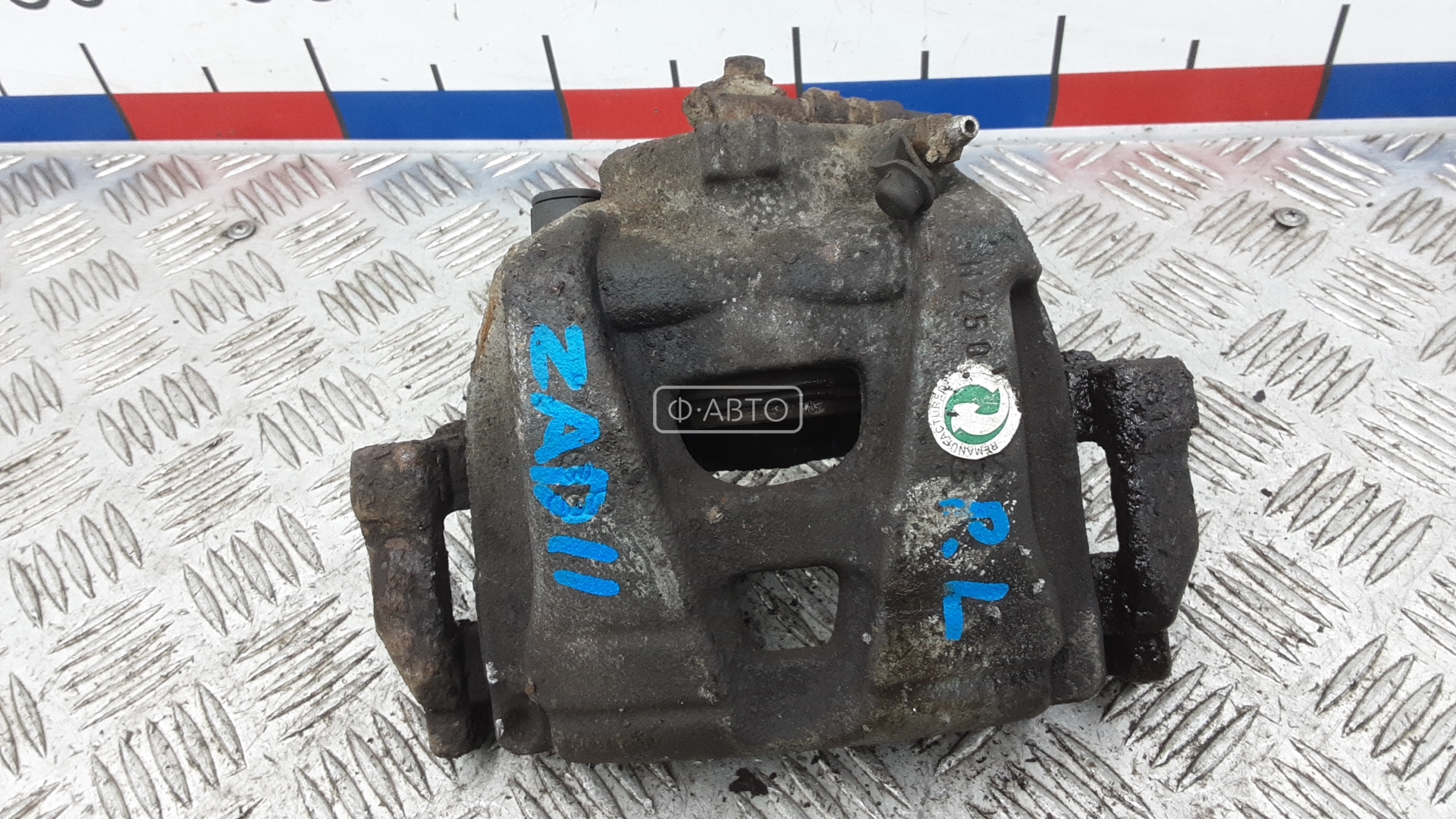 Суппорт тормозной передний левый