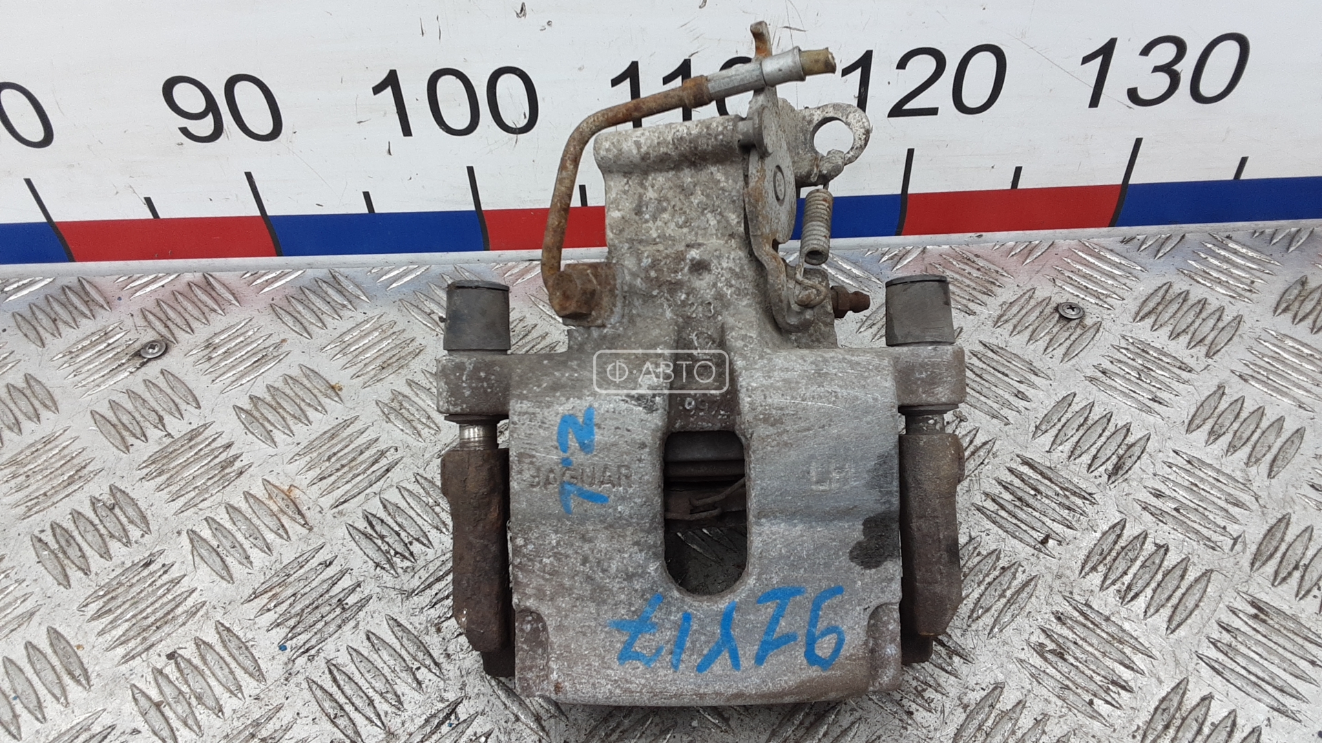 Суппорт тормозной задний левый