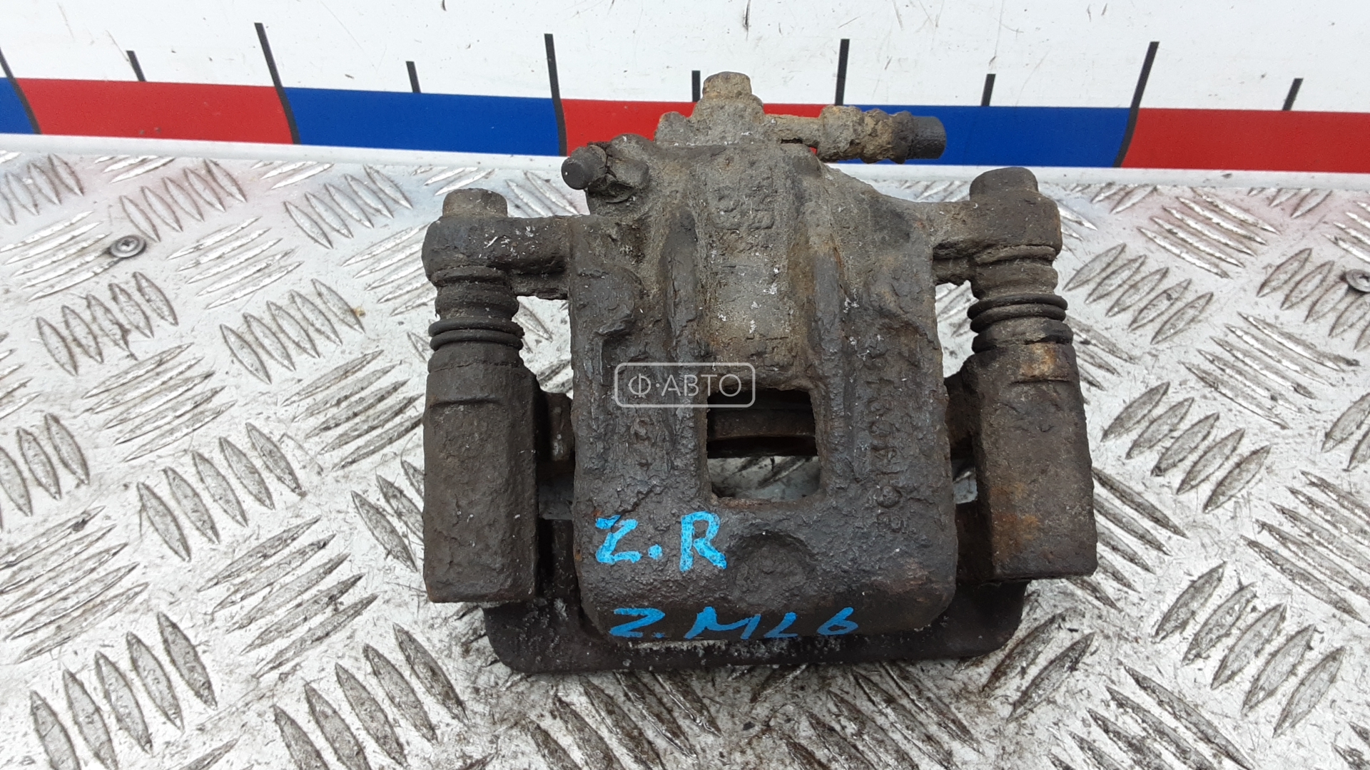 Суппорт тормозной задний правый