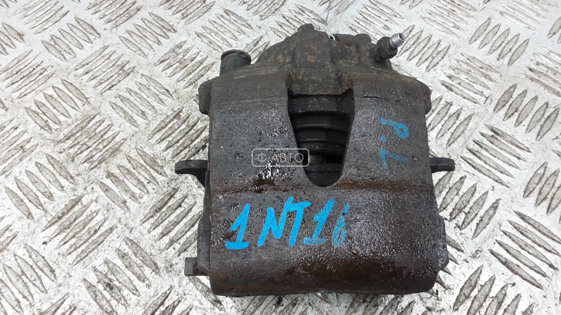 Суппорт тормозной передний левый