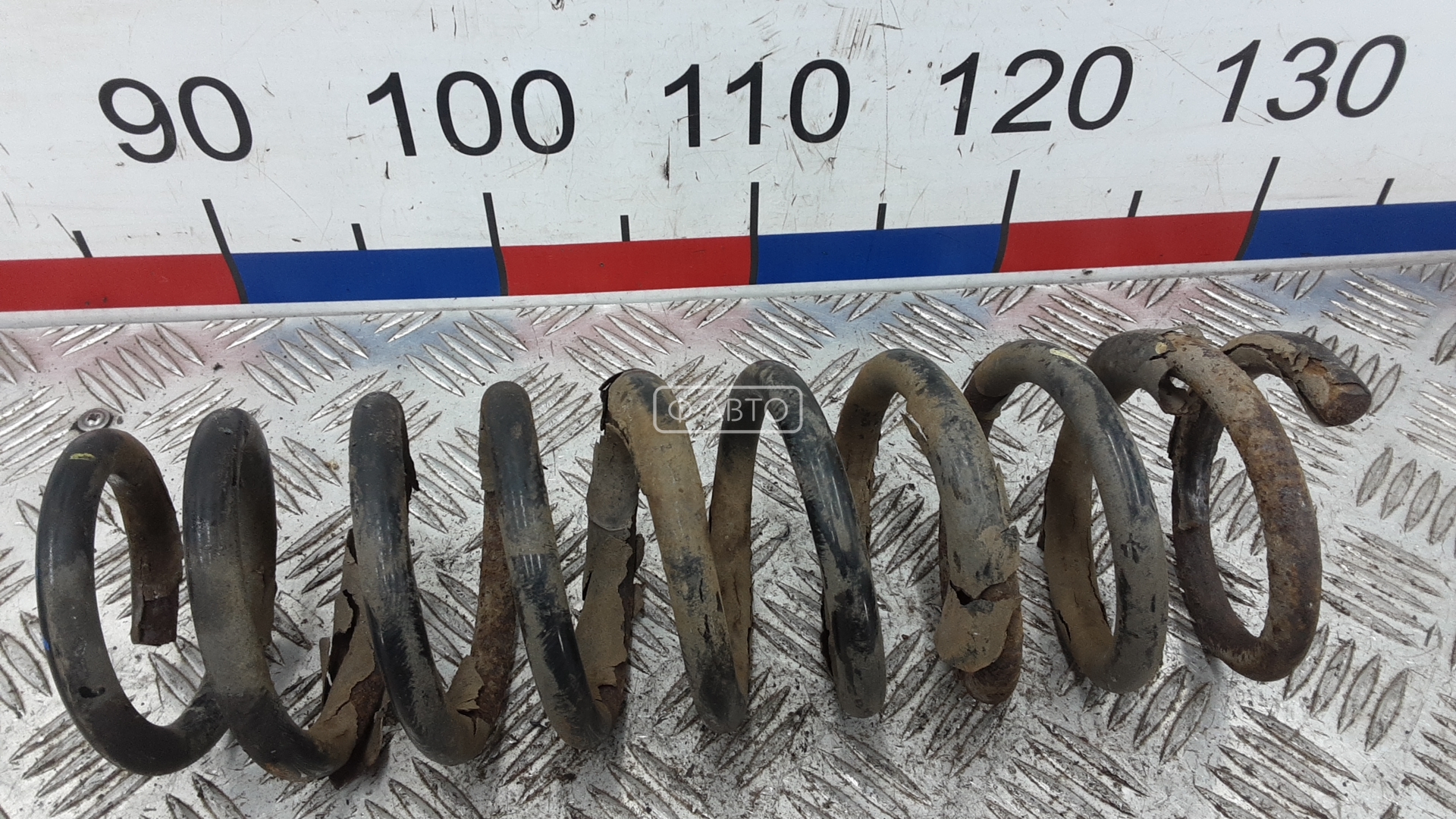 Пружина задняя