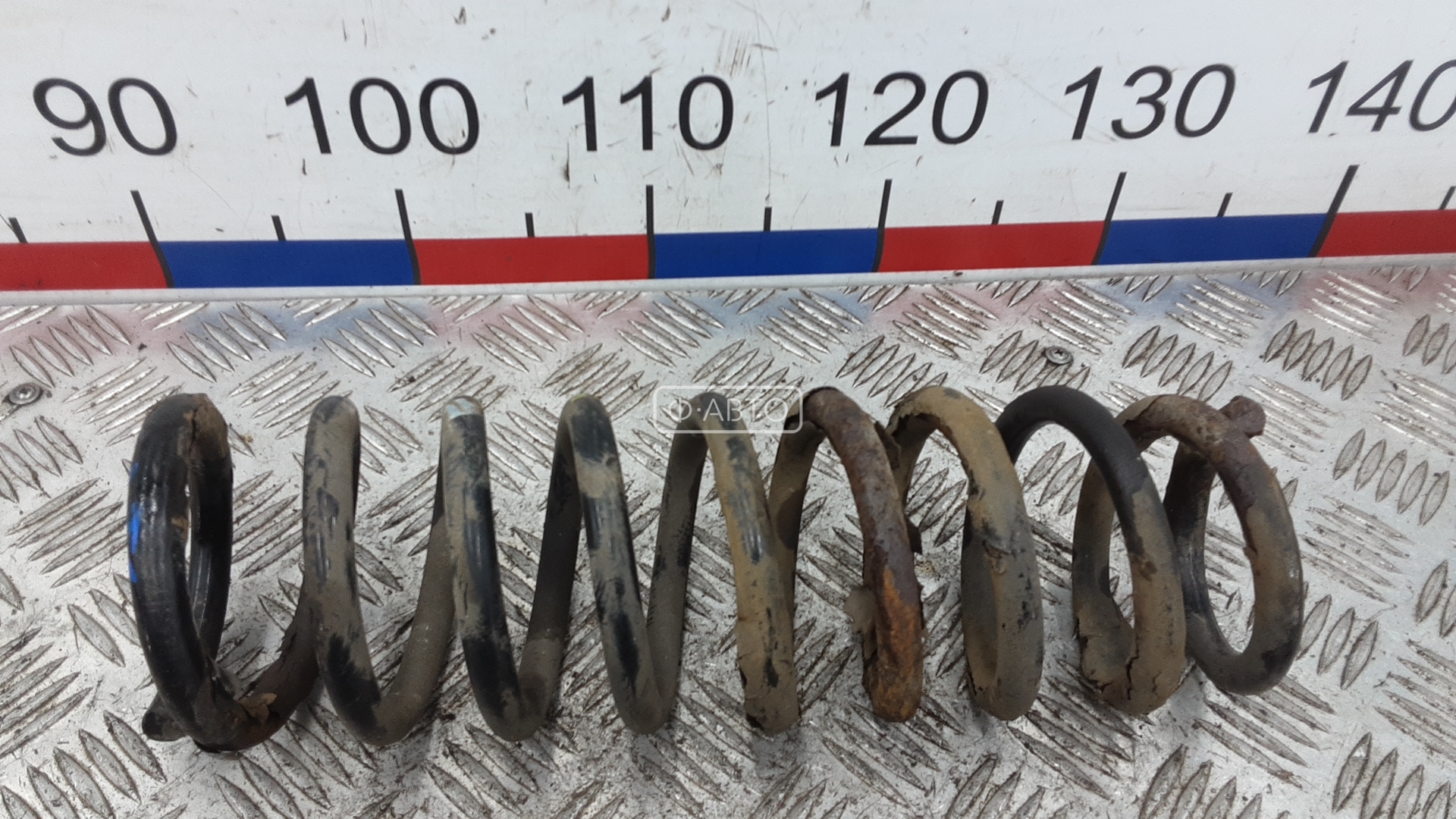 Пружина задняя