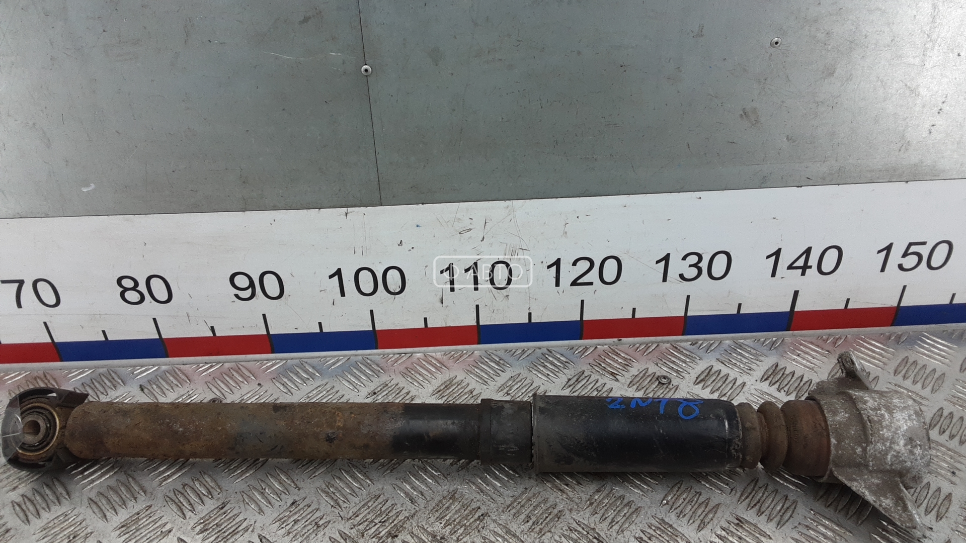 Амортизатор задней балки