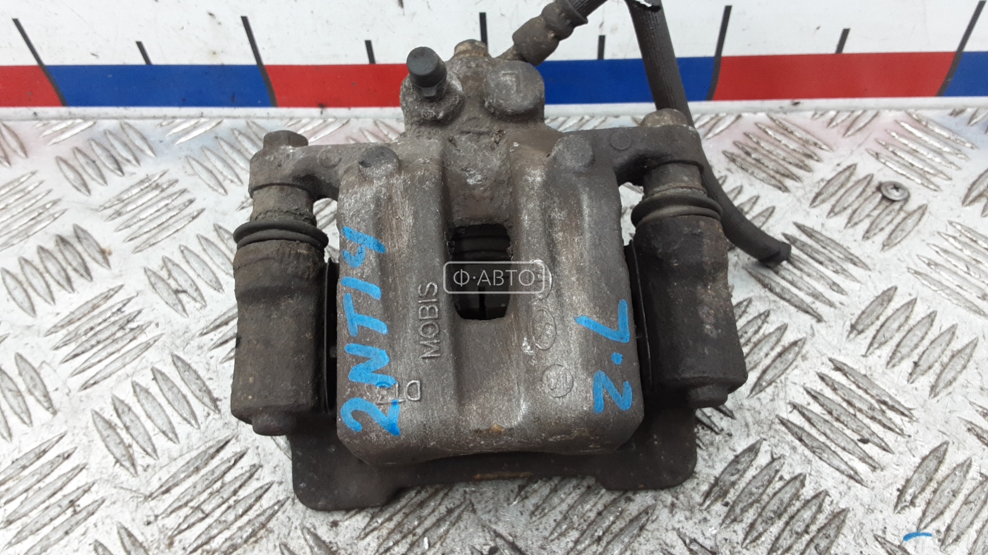 Суппорт тормозной задний левый