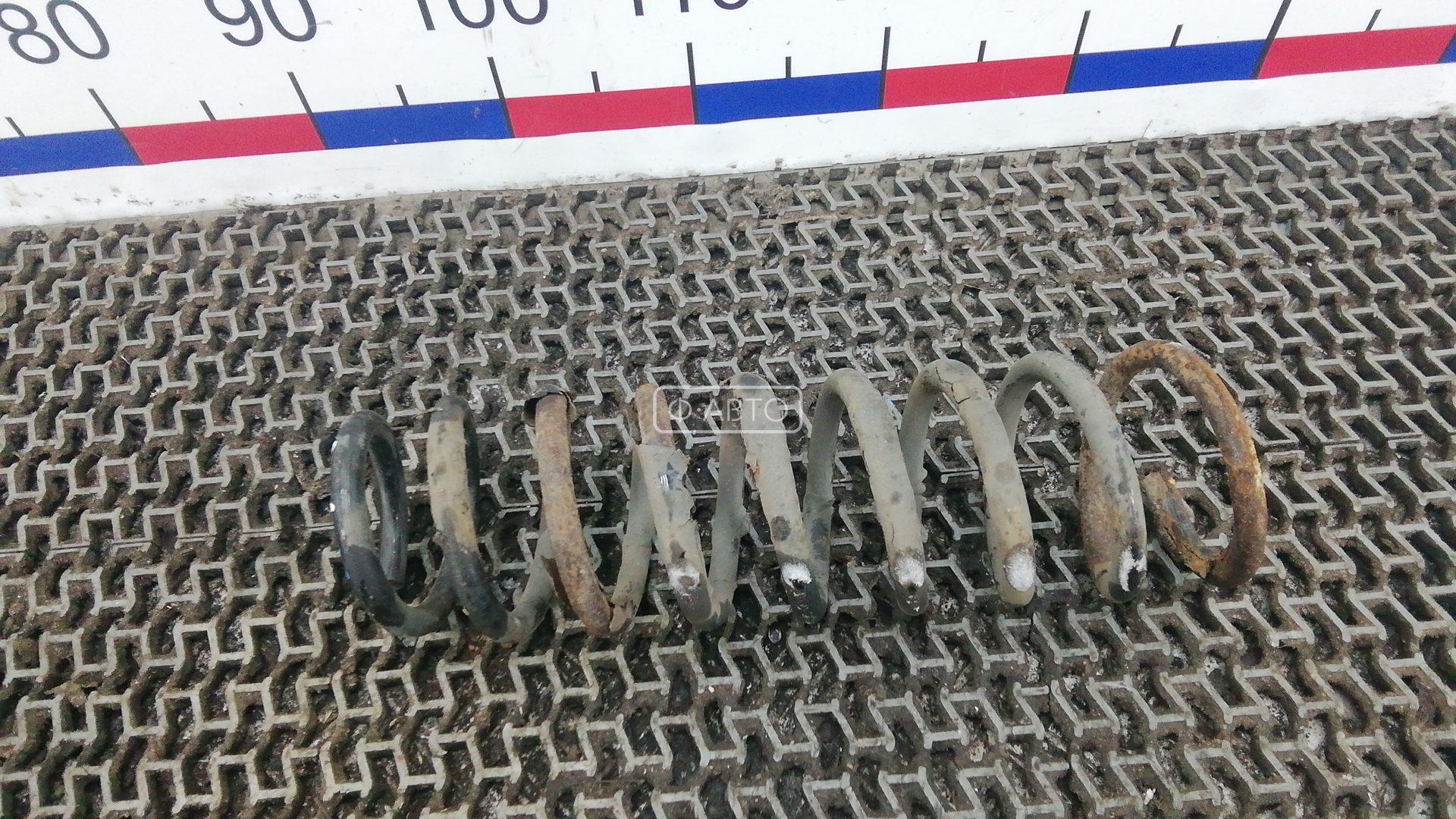 Пружина задняя