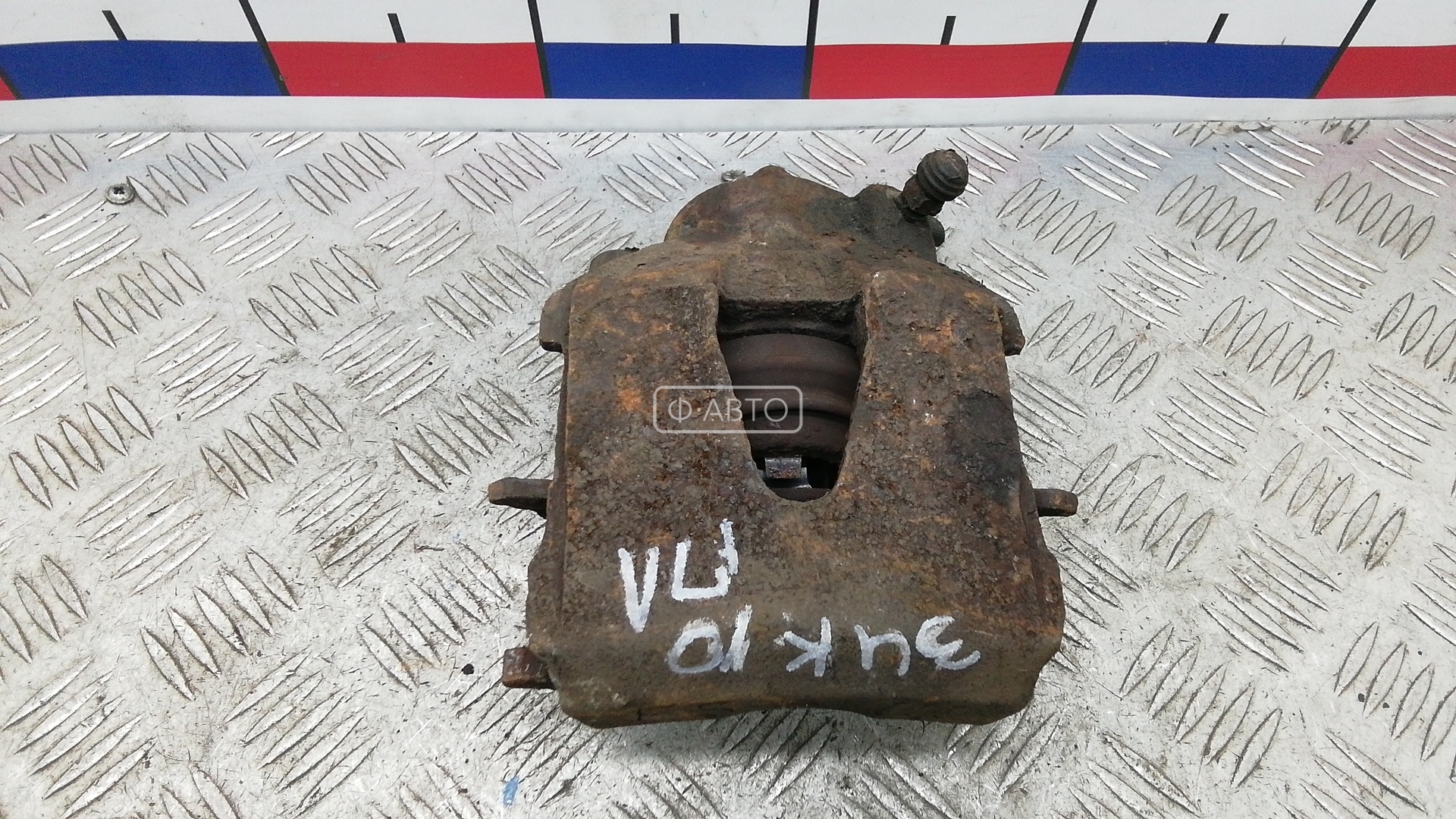 Суппорт тормозной передний левый