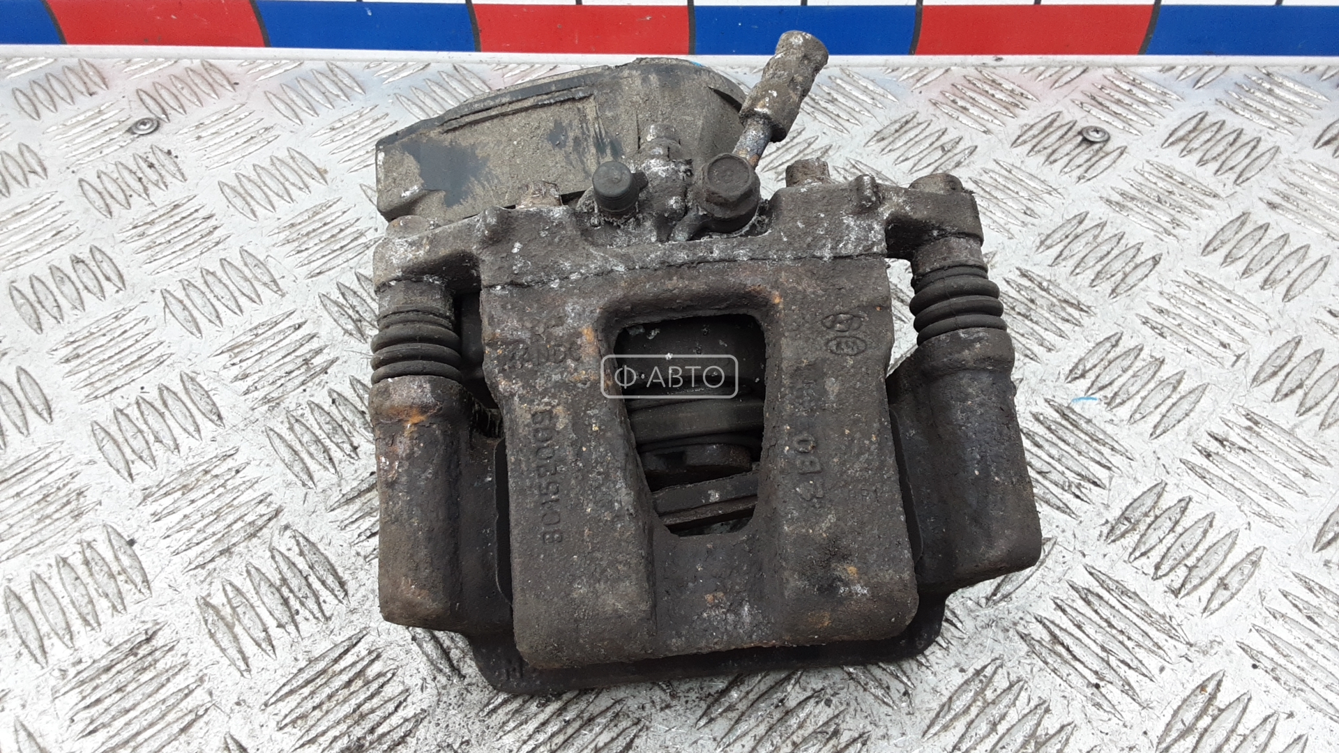 Суппорт тормозной задний левый