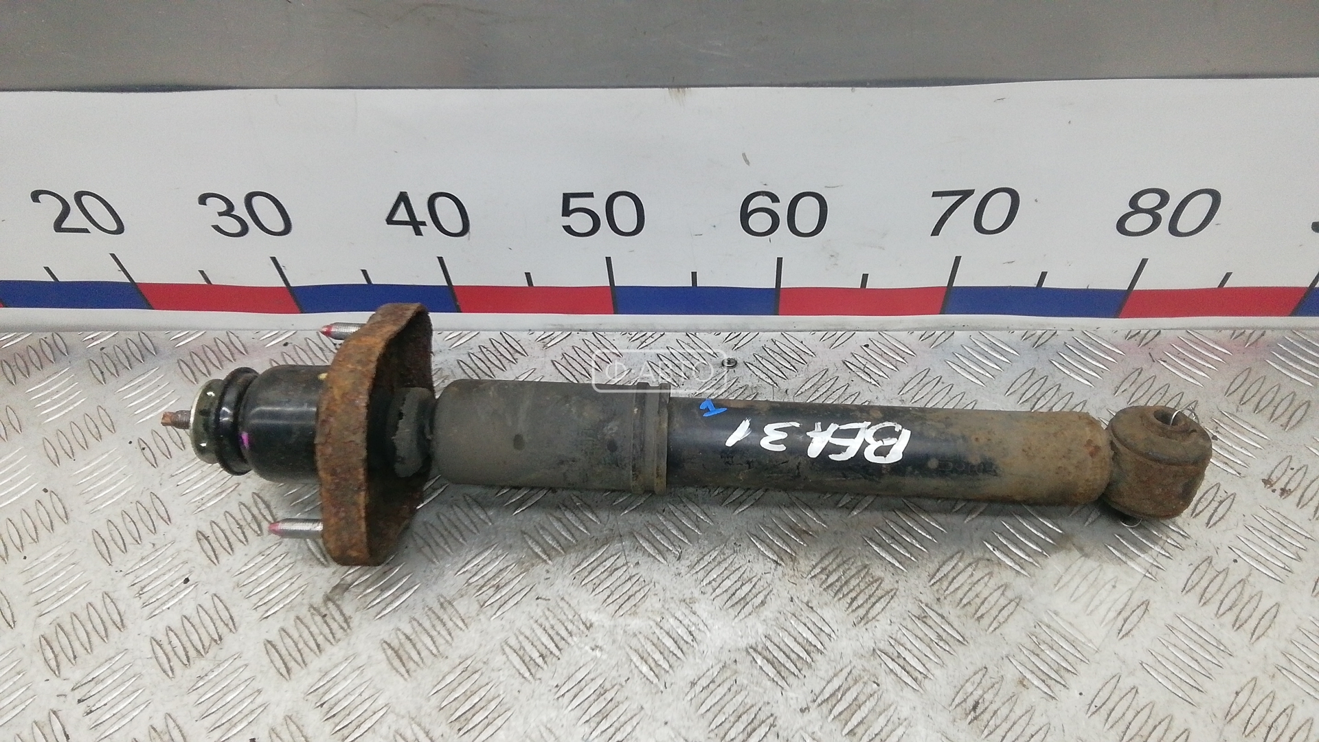 Амортизатор задней балки