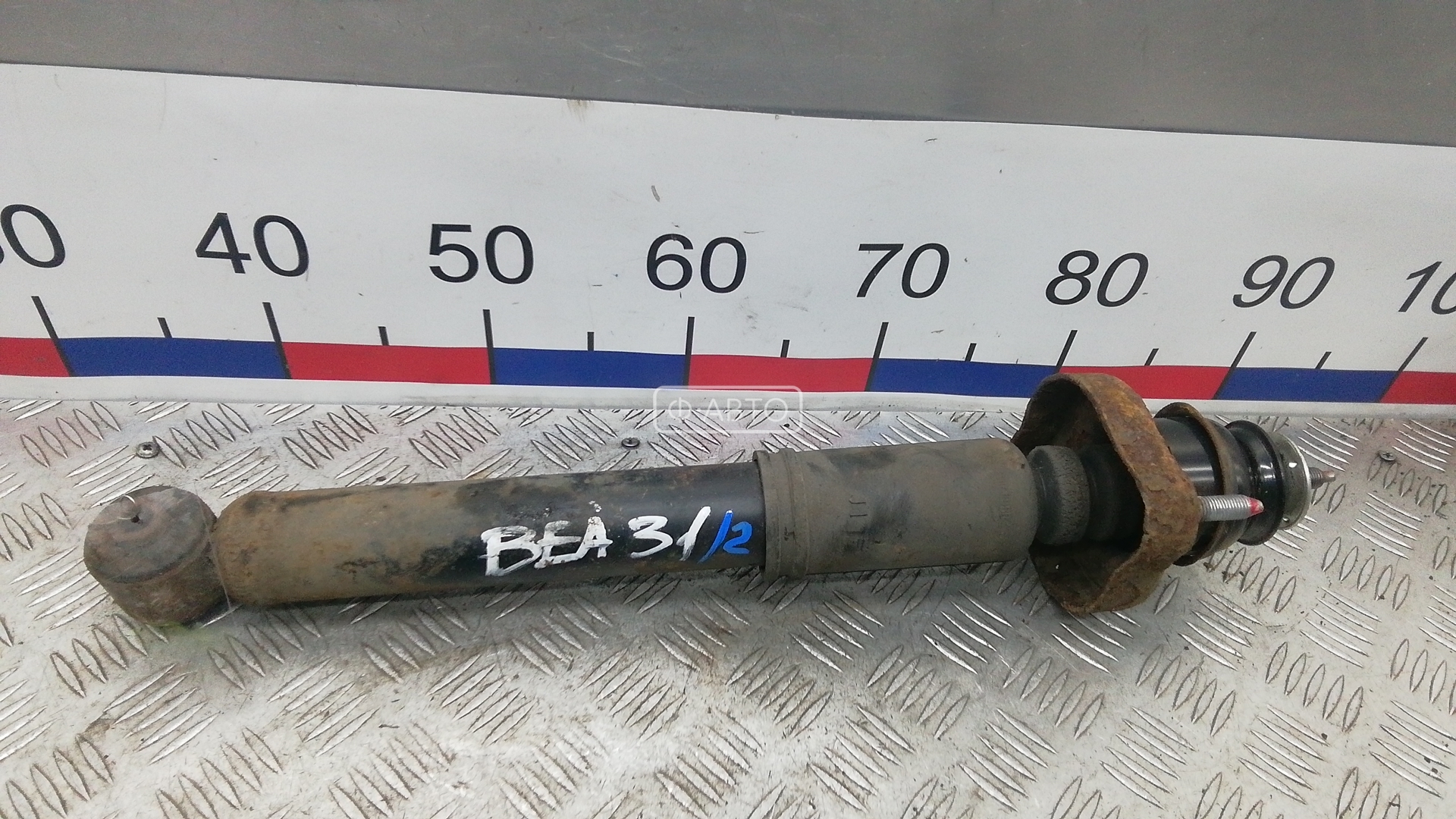 Амортизатор задней балки