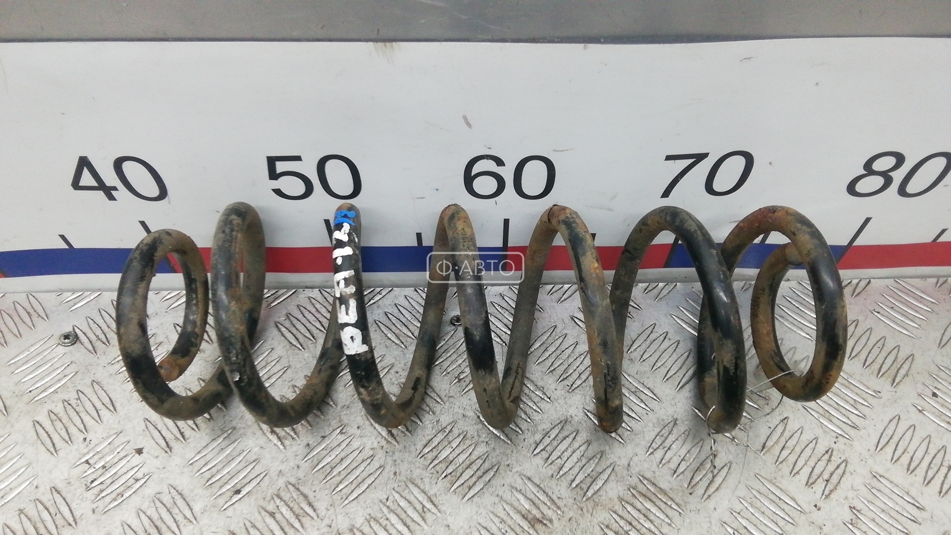 Пружина задняя