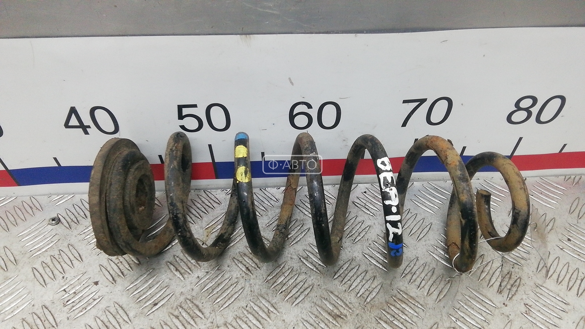 Пружина задняя