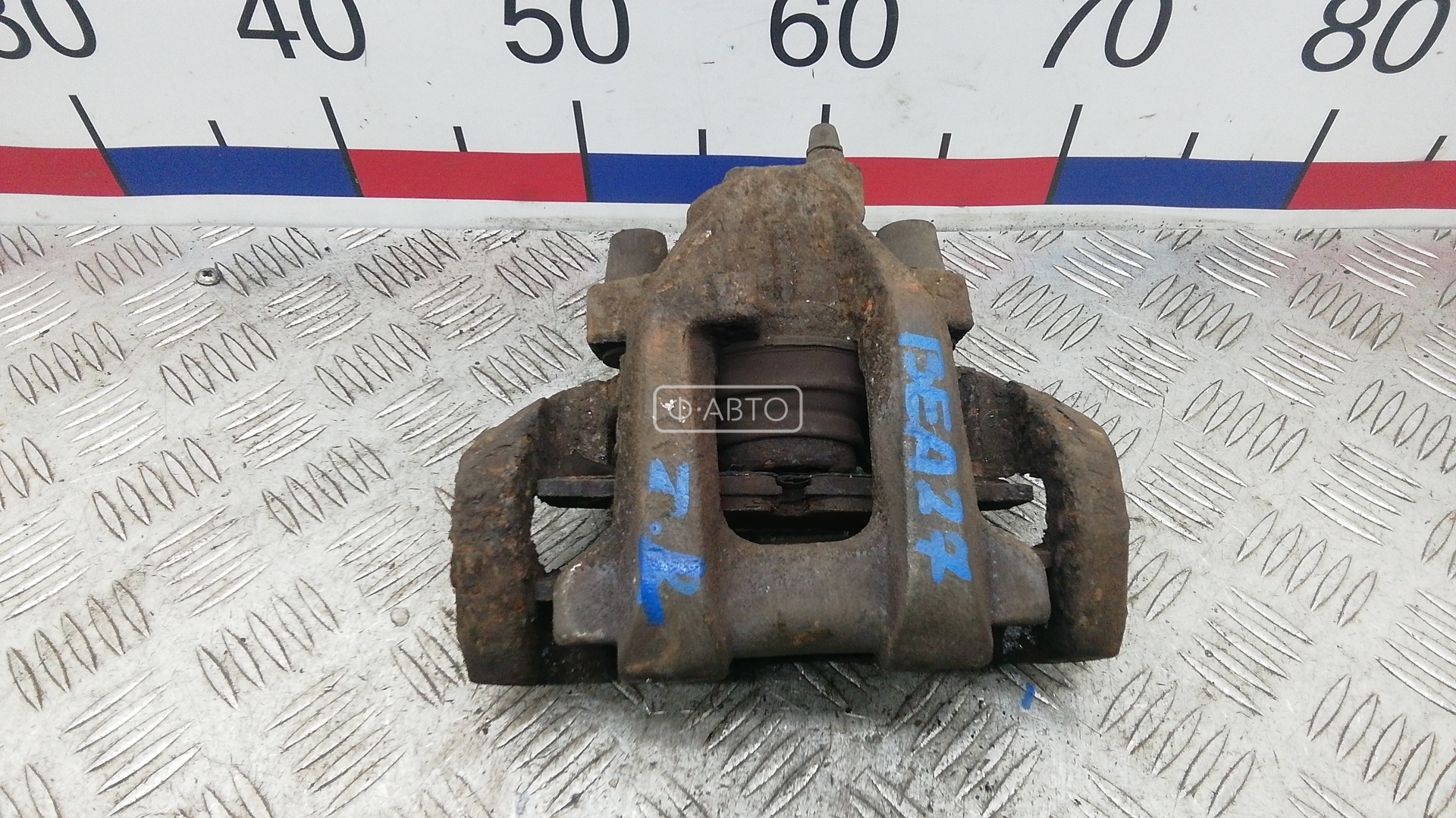 Суппорт тормозной задний левый