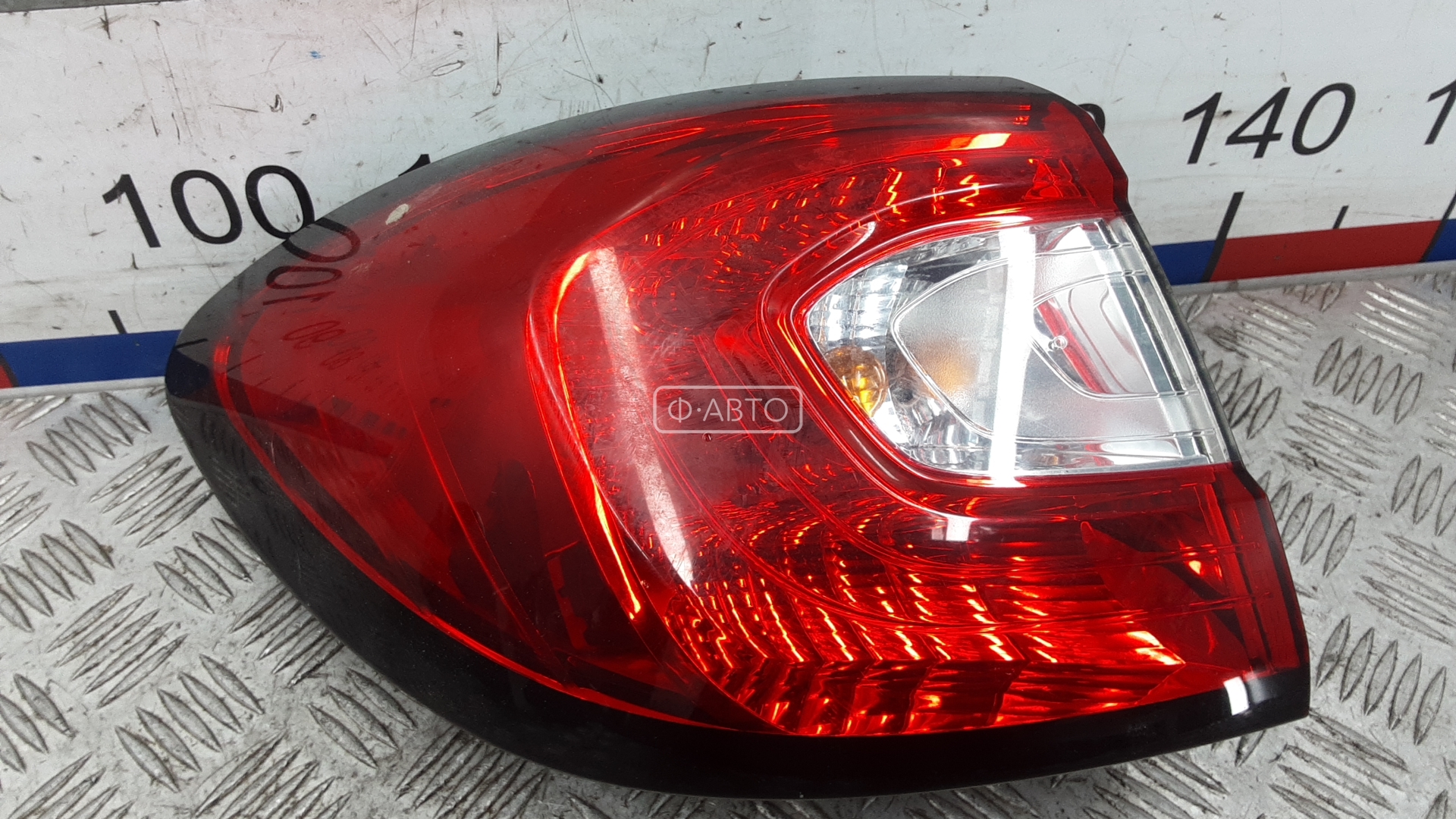 Фонарь задний левый