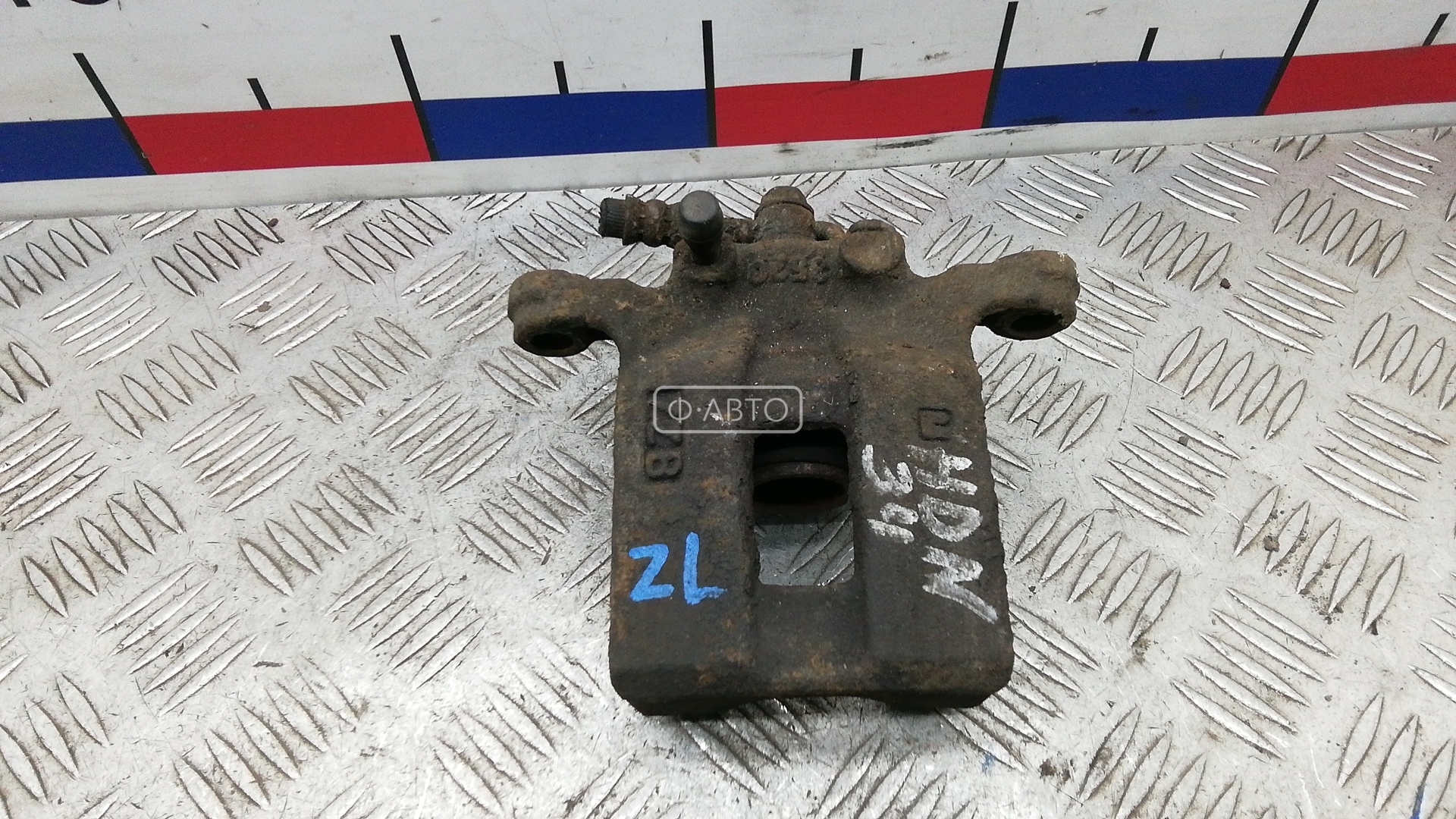 Суппорт тормозной задний левый