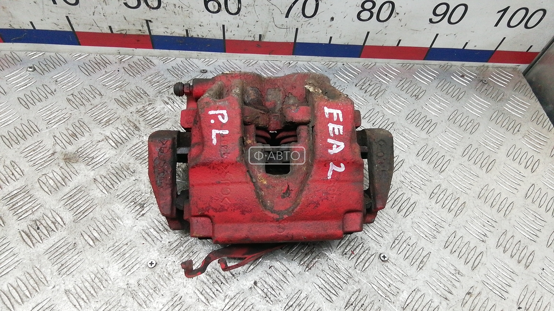 Суппорт тормозной передний левый