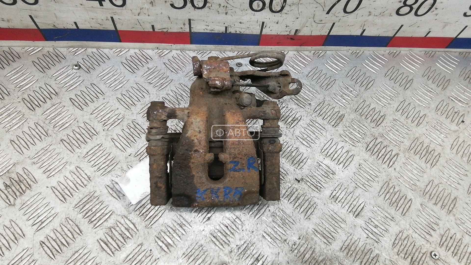 Суппорт тормозной задний правый