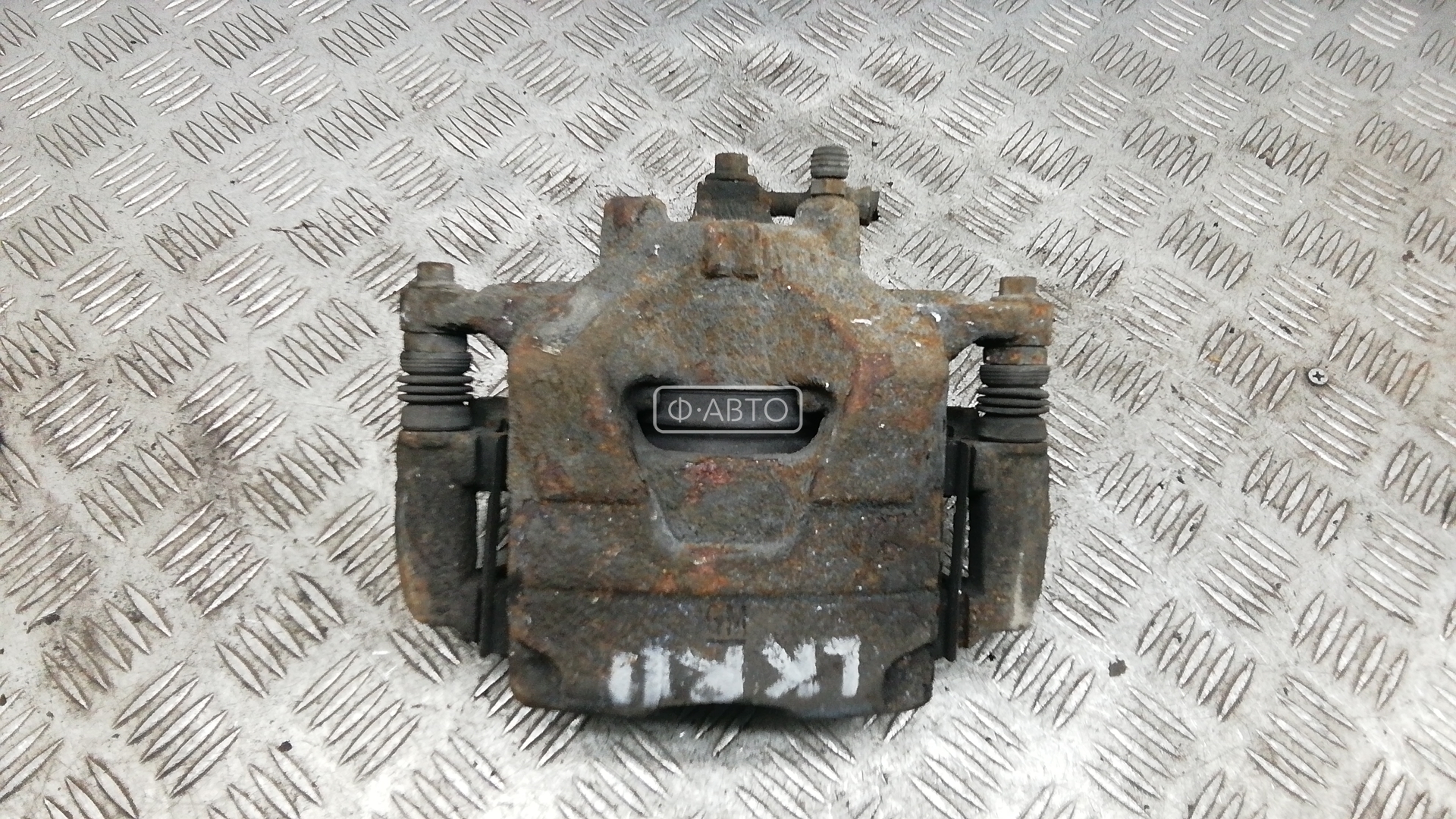 Суппорт тормозной передний левый