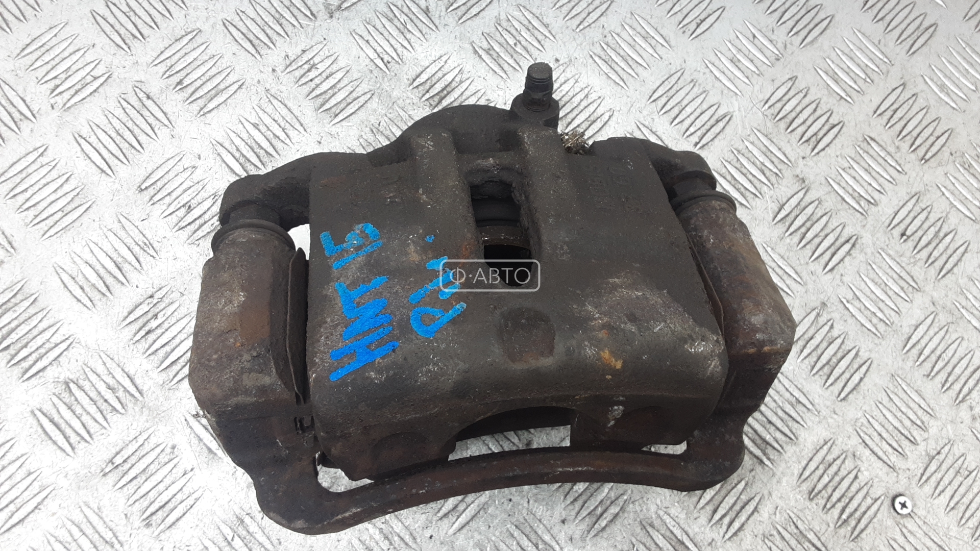 Суппорт тормозной передний левый