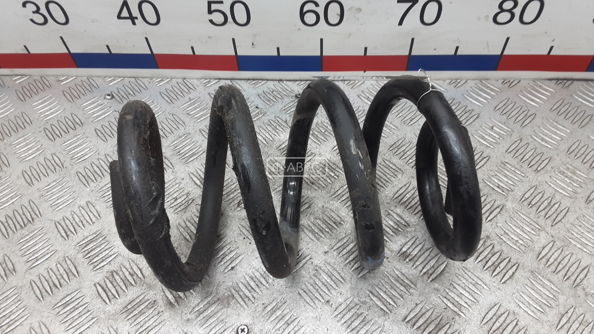 Пружина задняя