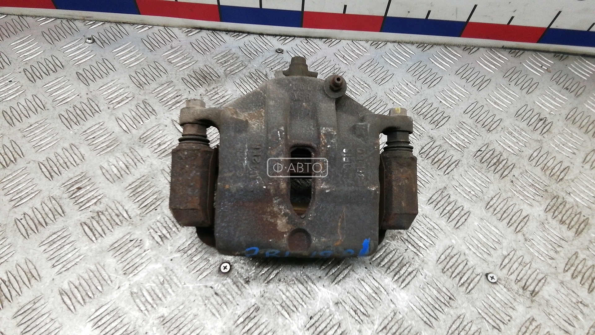 Суппорт тормозной передний левый