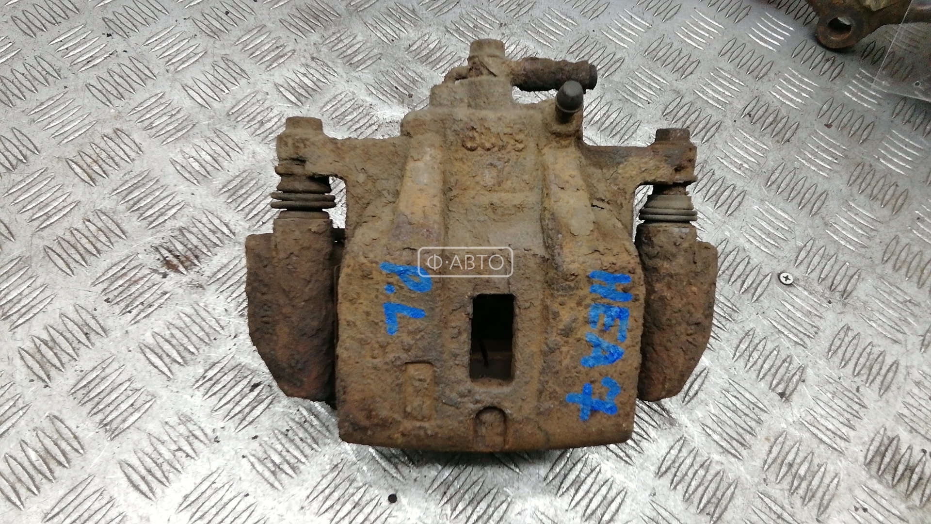 Суппорт тормозной передний левый