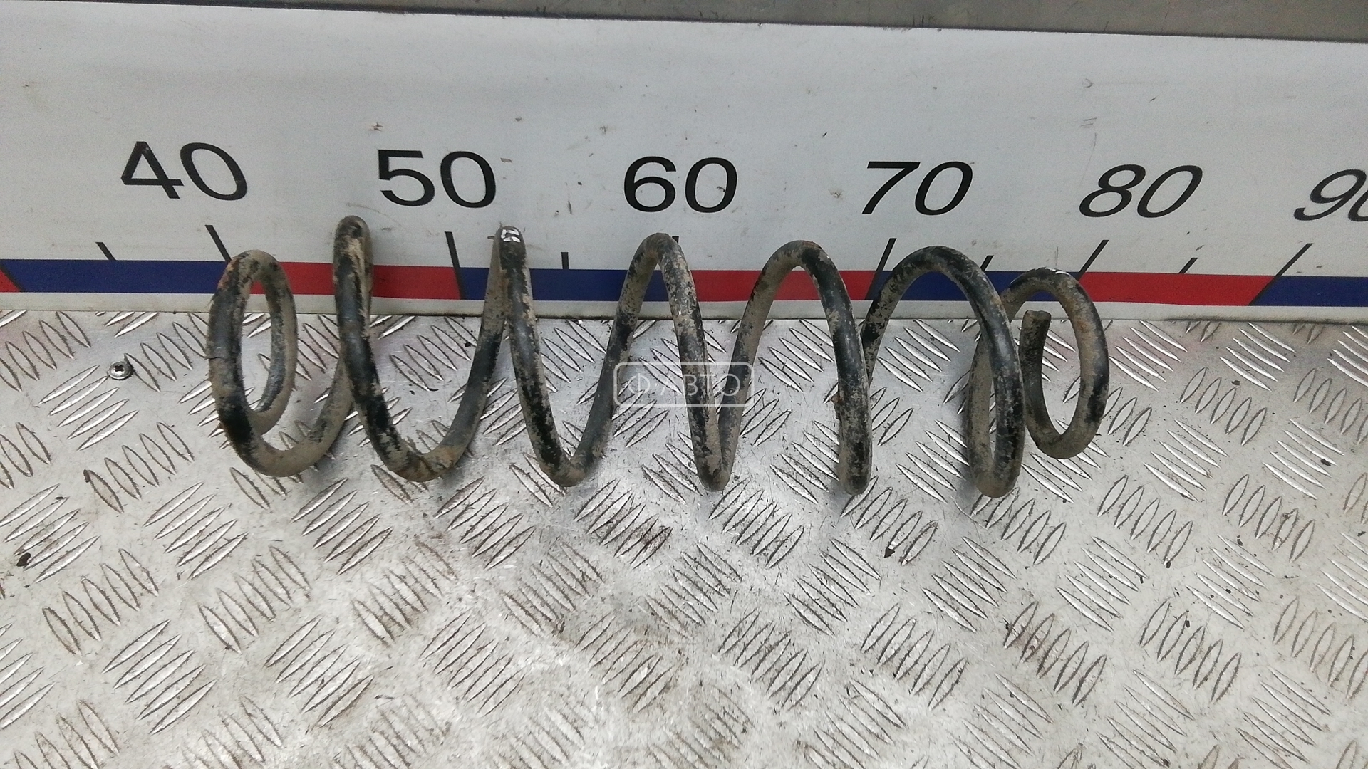 Пружина задняя