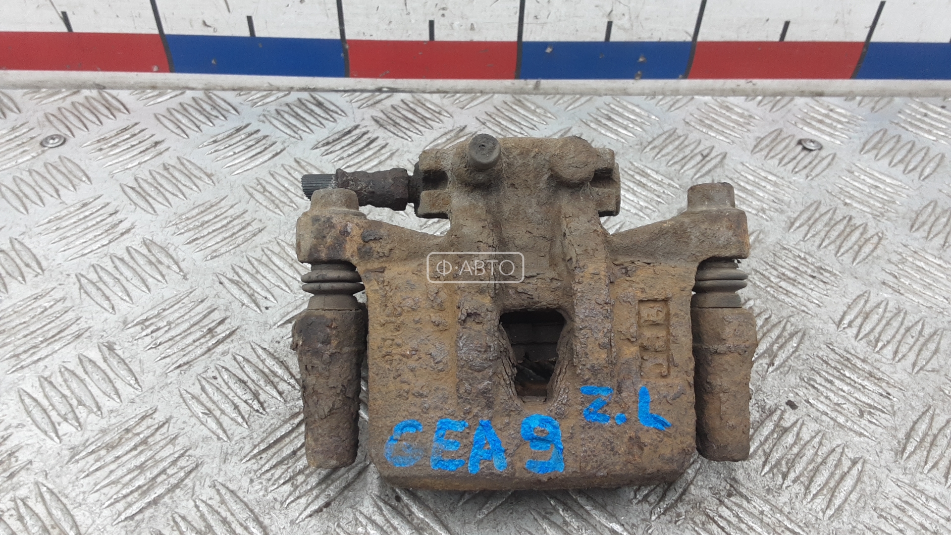 Суппорт тормозной задний левый